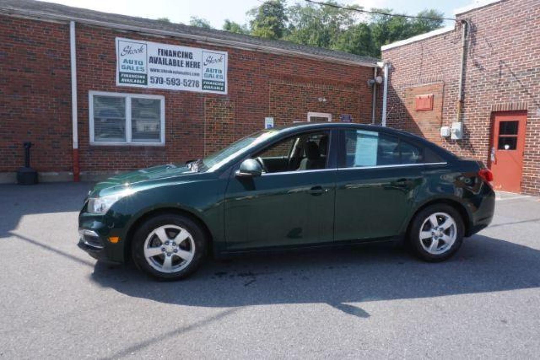 2015 Rainforest Green Metallic Chevrolet Cruze 1LT Auto (1G1PC5SB5F7) with an 1.4L L4 DOHC 16V TURBO engine, 6-Speed Automatic transmission, located at 312 Centre Ave, Schuylkill Haven, PA, 17972, (570) 593-5278, 40.638130, -76.177383 - Photo #0