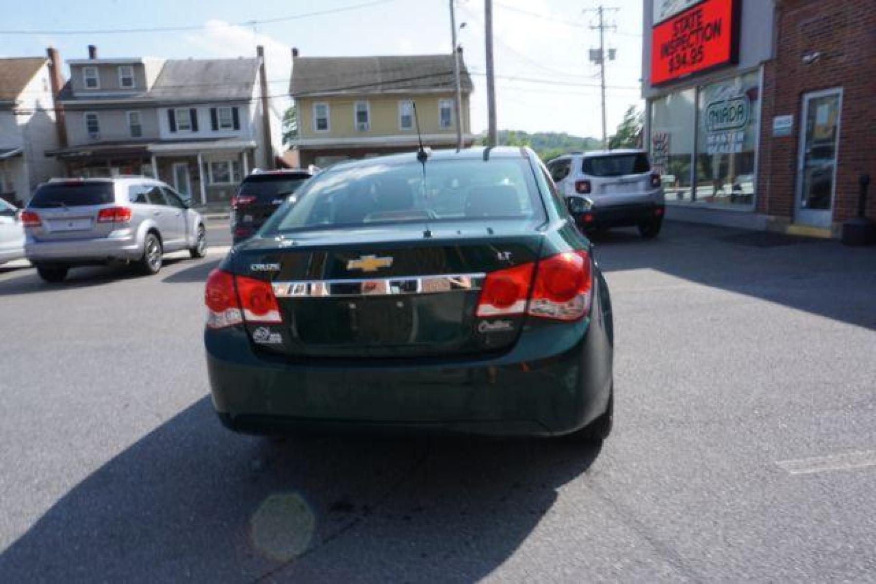 2015 Rainforest Green Metallic Chevrolet Cruze 1LT Auto (1G1PC5SB5F7) with an 1.4L L4 DOHC 16V TURBO engine, 6-Speed Automatic transmission, located at 312 Centre Ave, Schuylkill Haven, PA, 17972, (570) 593-5278, 40.638130, -76.177383 - Photo #10