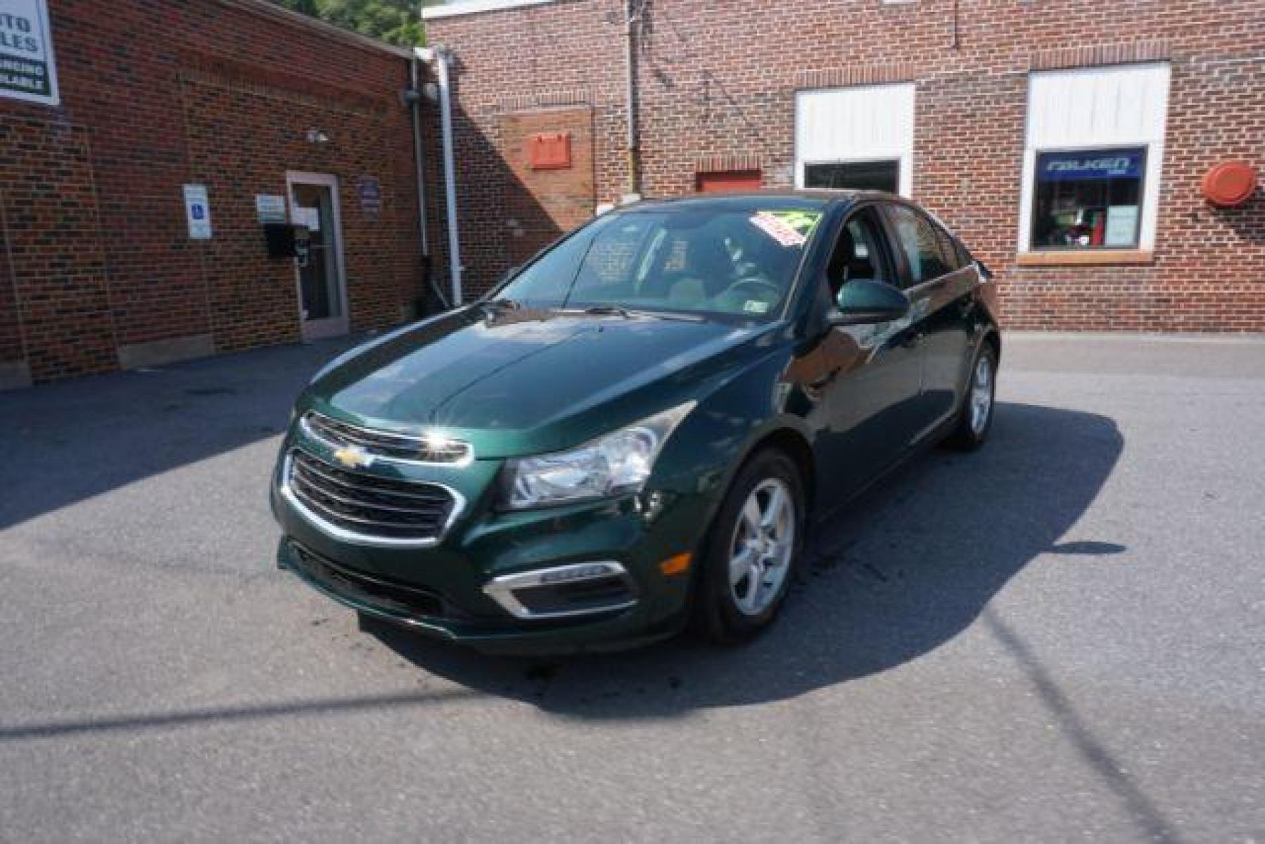 2015 Rainforest Green Metallic Chevrolet Cruze 1LT Auto (1G1PC5SB5F7) with an 1.4L L4 DOHC 16V TURBO engine, 6-Speed Automatic transmission, located at 312 Centre Ave, Schuylkill Haven, PA, 17972, (570) 593-5278, 40.638130, -76.177383 - Photo #2