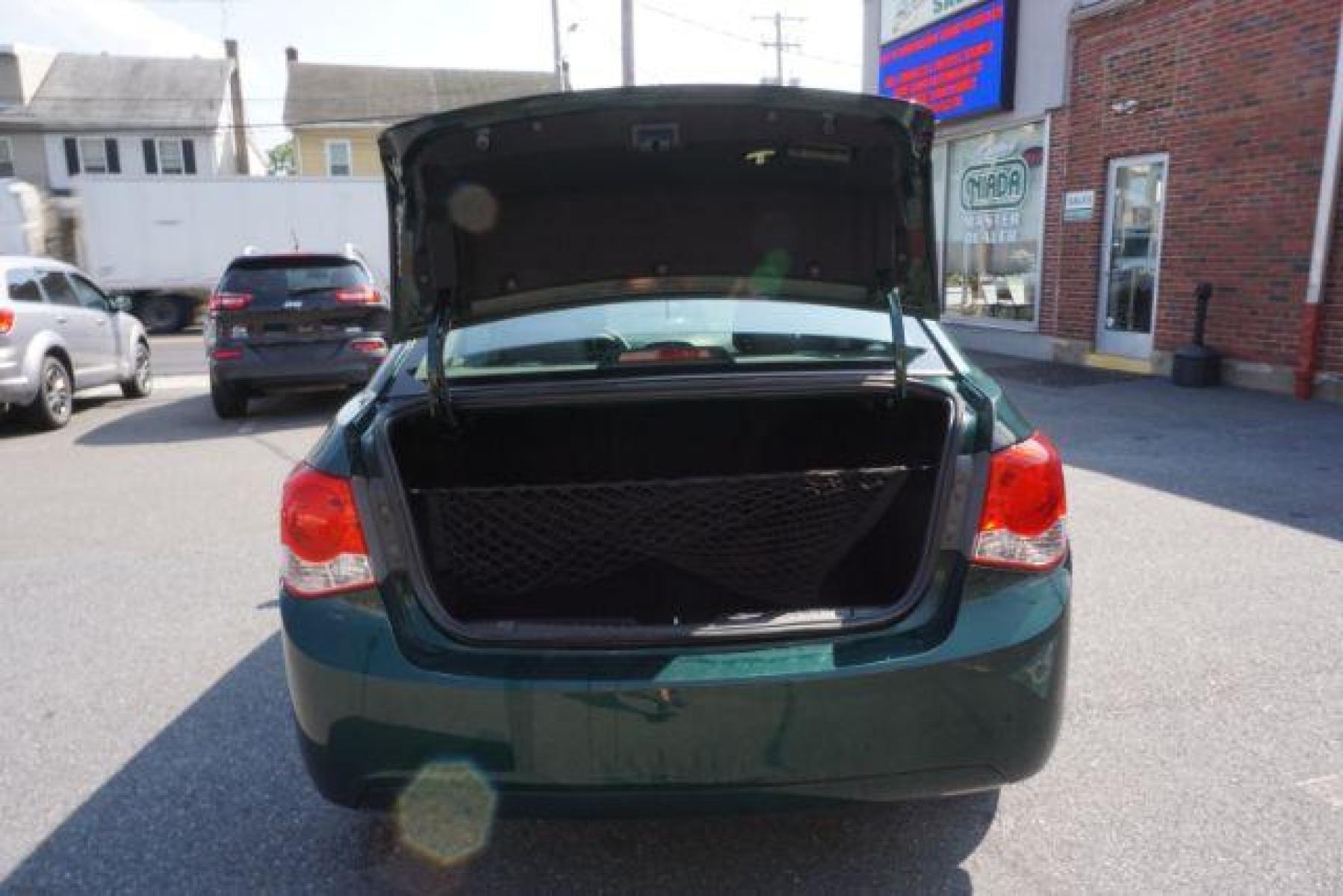 2015 Rainforest Green Metallic Chevrolet Cruze 1LT Auto (1G1PC5SB5F7) with an 1.4L L4 DOHC 16V TURBO engine, 6-Speed Automatic transmission, located at 312 Centre Ave, Schuylkill Haven, PA, 17972, (570) 593-5278, 40.638130, -76.177383 - Photo #40