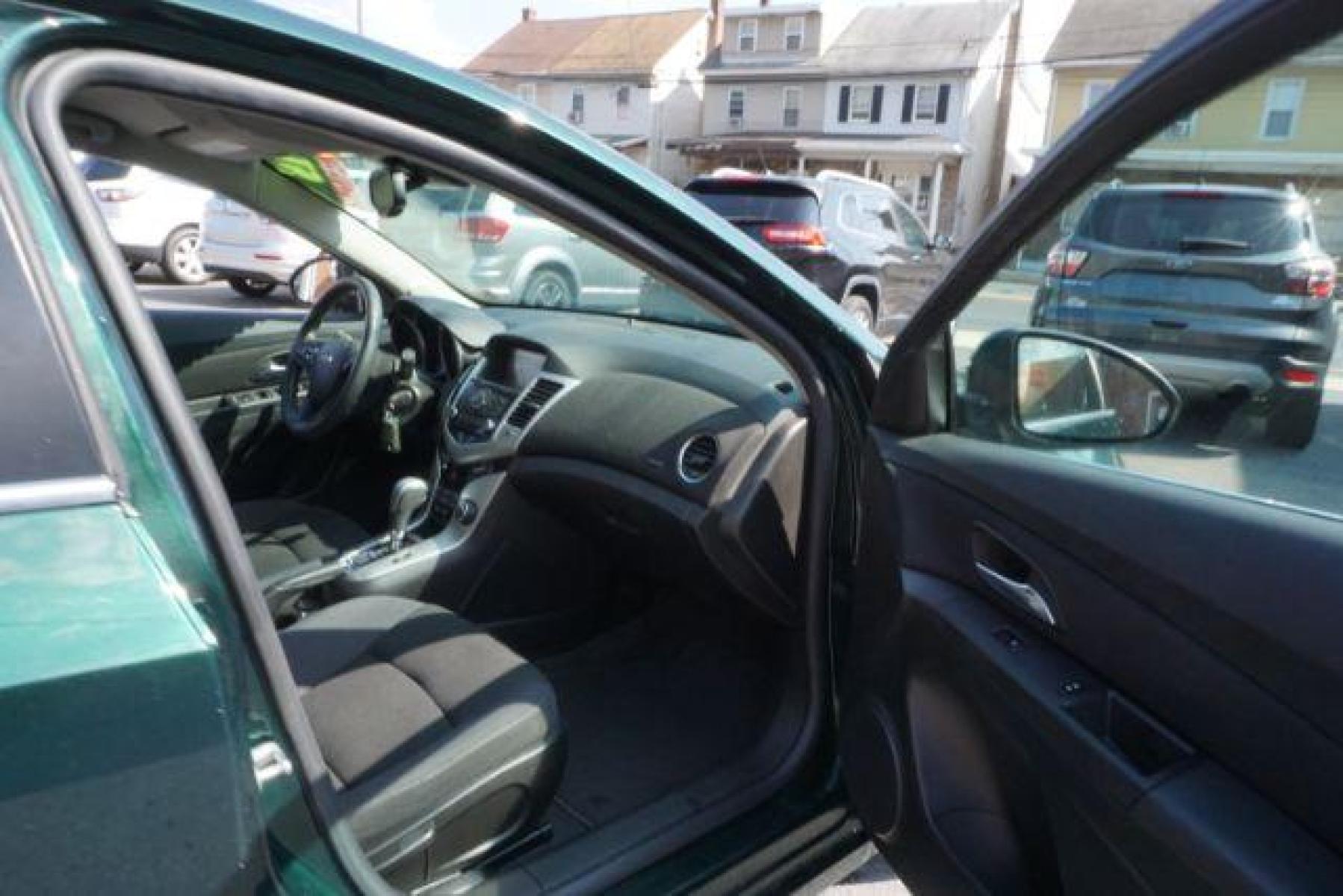 2015 Rainforest Green Metallic Chevrolet Cruze 1LT Auto (1G1PC5SB5F7) with an 1.4L L4 DOHC 16V TURBO engine, 6-Speed Automatic transmission, located at 312 Centre Ave, Schuylkill Haven, PA, 17972, (570) 593-5278, 40.638130, -76.177383 - Photo #48