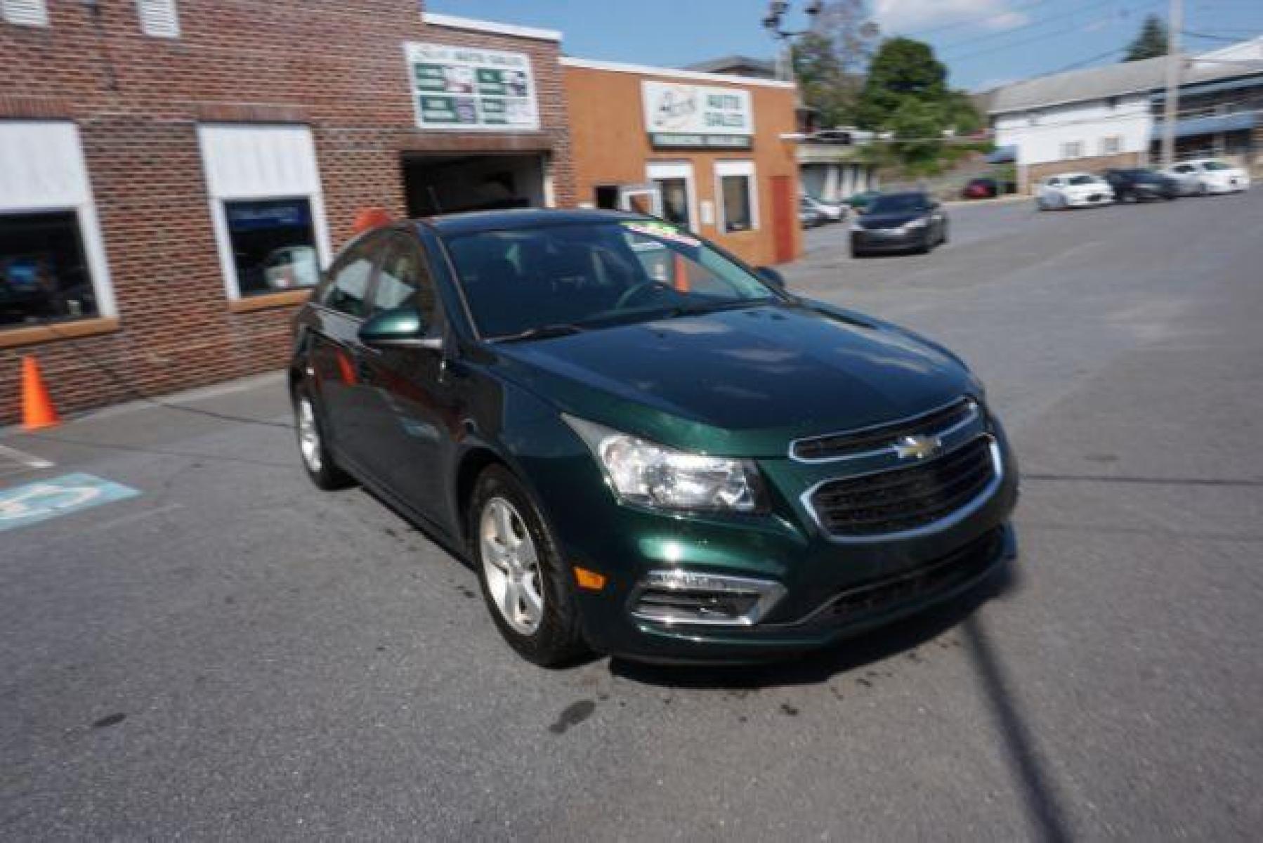 2015 Rainforest Green Metallic Chevrolet Cruze 1LT Auto (1G1PC5SB5F7) with an 1.4L L4 DOHC 16V TURBO engine, 6-Speed Automatic transmission, located at 312 Centre Ave, Schuylkill Haven, PA, 17972, (570) 593-5278, 40.638130, -76.177383 - Photo #4