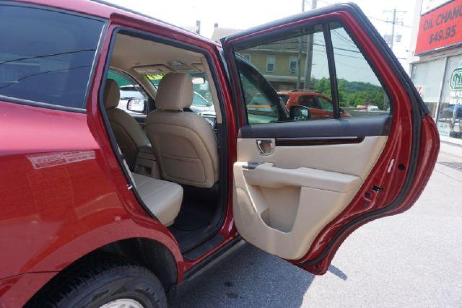 2011 Sonoran Red Hyundai Santa Fe GL 2.4 4WD (5XYZGDAB0BG) with an 2.4L L4 DOHC 16V engine, 6-Speed Automatic transmission, located at 312 Centre Ave, Schuylkill Haven, PA, 17972, (570) 593-5278, 40.638130, -76.177383 - Photo#35