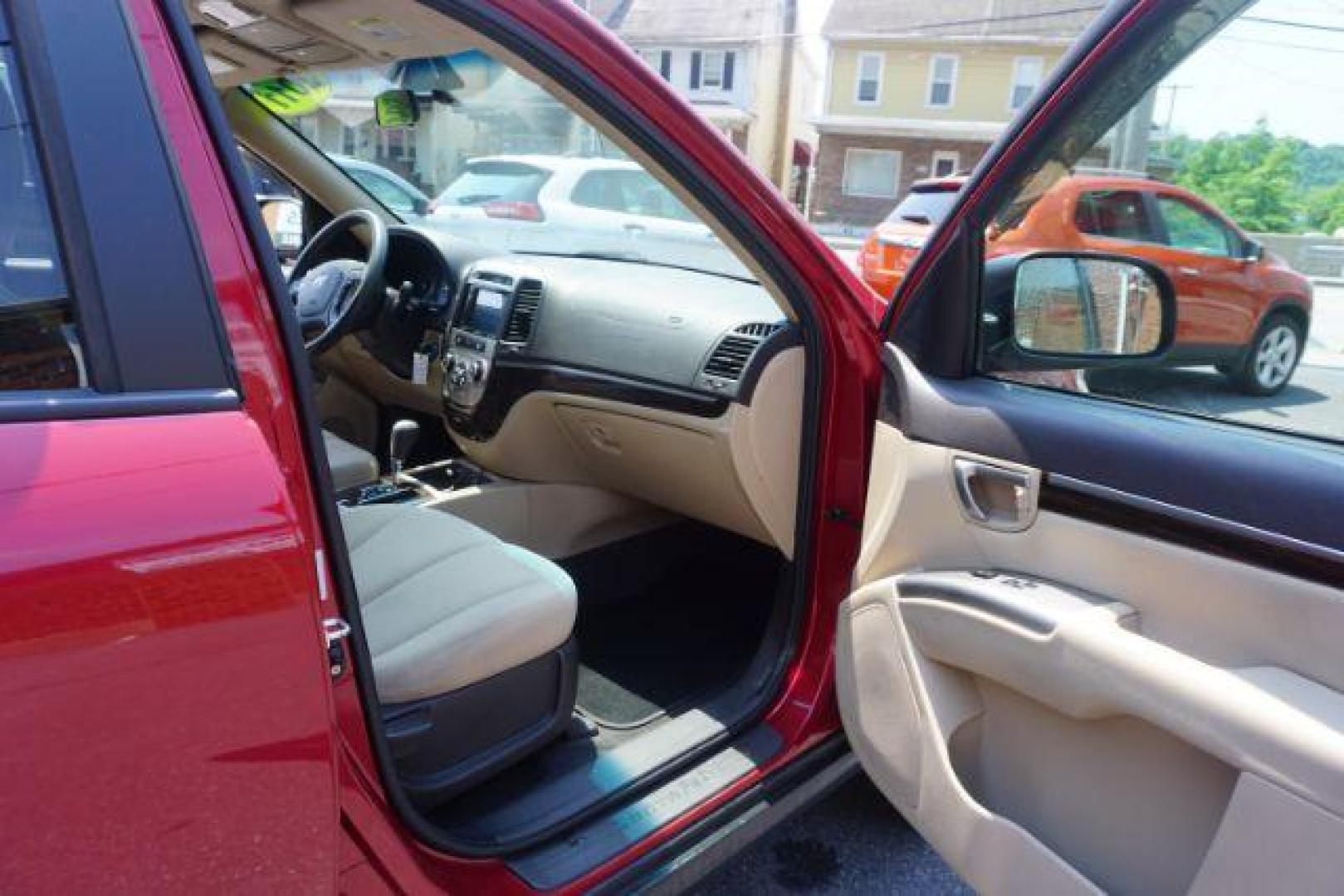 2011 Sonoran Red Hyundai Santa Fe GL 2.4 4WD (5XYZGDAB0BG) with an 2.4L L4 DOHC 16V engine, 6-Speed Automatic transmission, located at 312 Centre Ave, Schuylkill Haven, PA, 17972, (570) 593-5278, 40.638130, -76.177383 - Photo#44