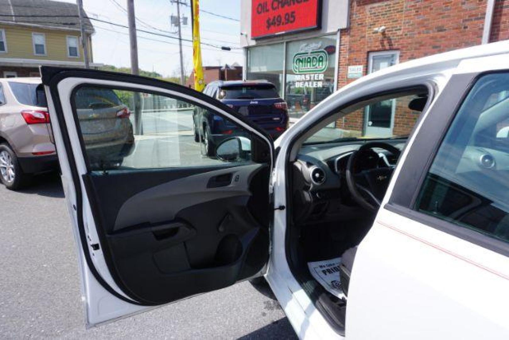2017 White Chevrolet Sonic FL Auto Hatchback (1G1JG6SH8H4) with an 1.8L L4 DOHC 24V engine, 6-Speed Automatic transmission, located at 312 Centre Ave, Schuylkill Haven, PA, 17972, (570) 593-5278, 40.638130, -76.177383 - Photo#16