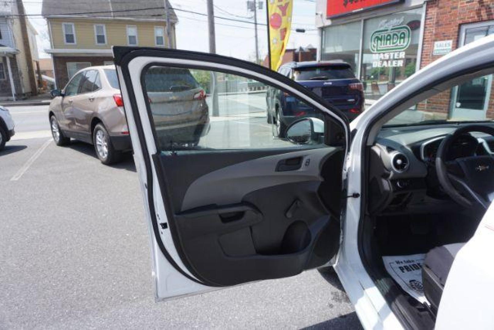 2017 White Chevrolet Sonic FL Auto Hatchback (1G1JG6SH8H4) with an 1.8L L4 DOHC 24V engine, 6-Speed Automatic transmission, located at 312 Centre Ave, Schuylkill Haven, PA, 17972, (570) 593-5278, 40.638130, -76.177383 - Photo#17