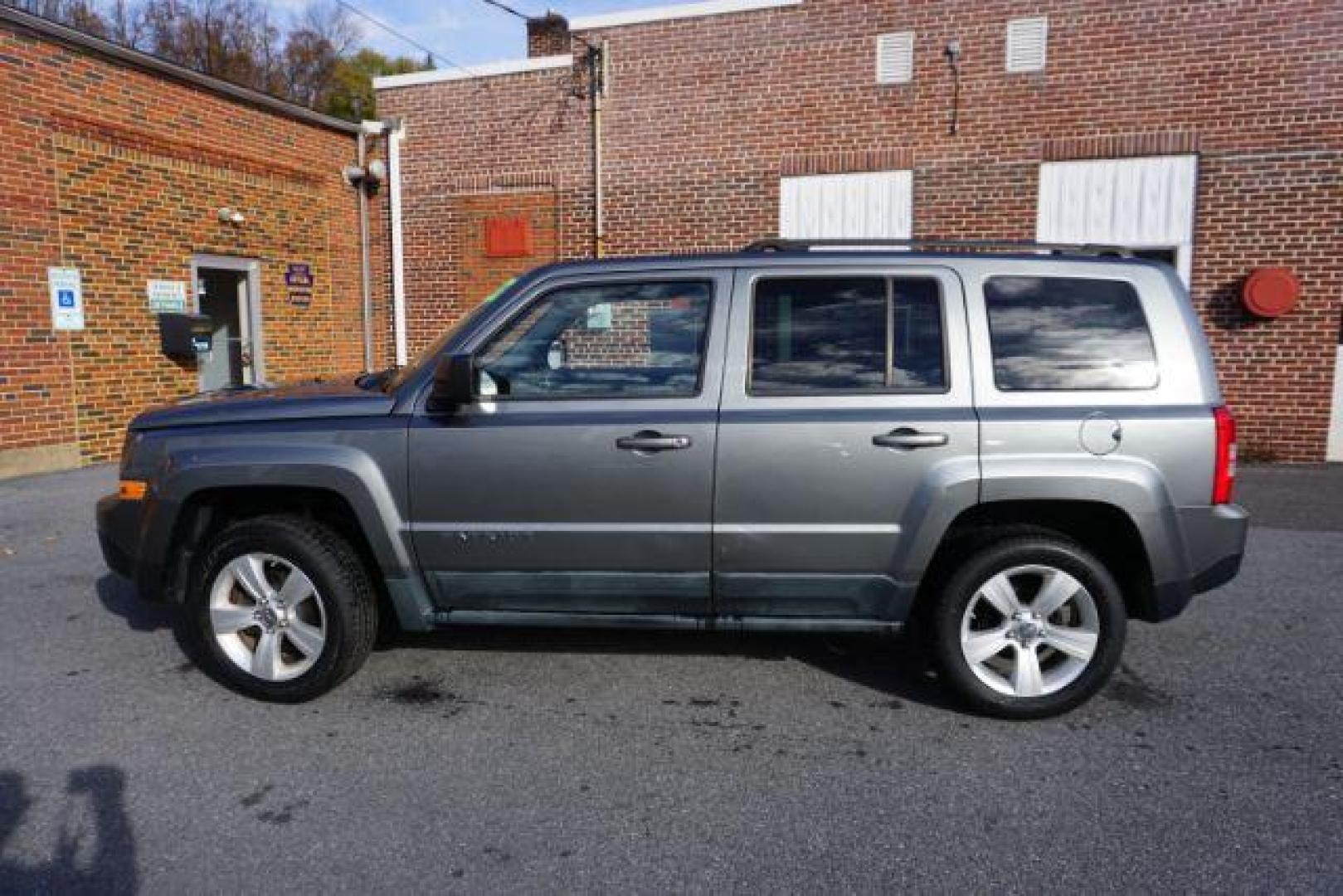 2011 Bright Silver Metall /Dark Slate Gray Clot Jeep Patriot 4WD (1J4NF1GB9BD) with an 2.4L L4 DOHC 16V engine, located at 312 Centre Ave, Schuylkill Haven, PA, 17972, (570) 593-5278, 40.638130, -76.177383 - Photo#0