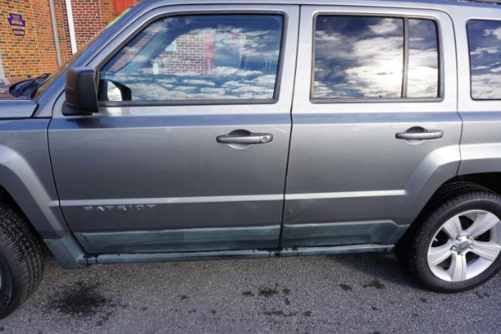 2011 Bright Silver Metall /Dark Slate Gray Clot Jeep Patriot 4WD (1J4NF1GB9BD) with an 2.4L L4 DOHC 16V engine, located at 312 Centre Ave, Schuylkill Haven, PA, 17972, (570) 593-5278, 40.638130, -76.177383 - Photo#6