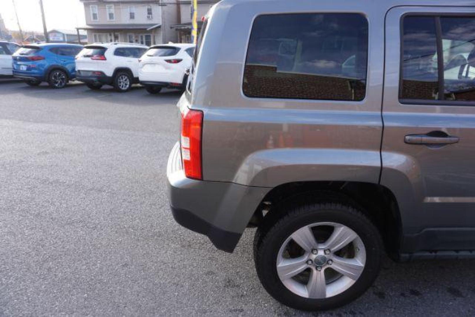 2011 Bright Silver Metall /Dark Slate Gray Clot Jeep Patriot 4WD (1J4NF1GB9BD) with an 2.4L L4 DOHC 16V engine, located at 312 Centre Ave, Schuylkill Haven, PA, 17972, (570) 593-5278, 40.638130, -76.177383 - Photo#14