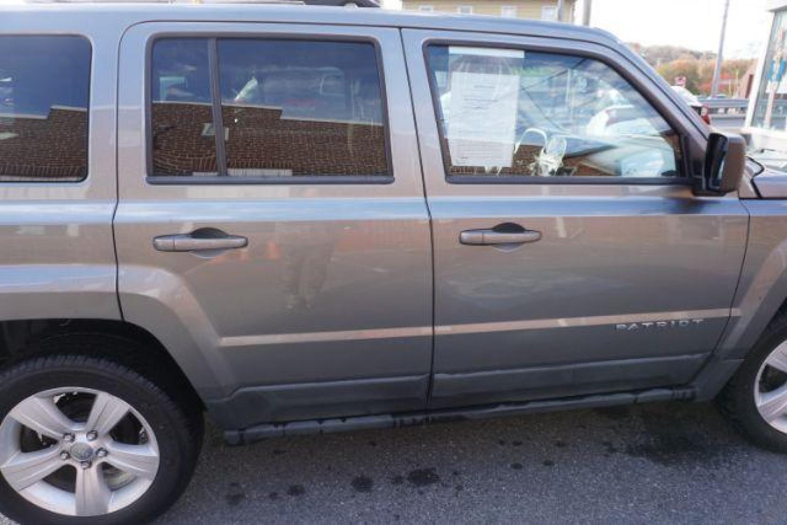 2011 Bright Silver Metall /Dark Slate Gray Clot Jeep Patriot 4WD (1J4NF1GB9BD) with an 2.4L L4 DOHC 16V engine, located at 312 Centre Ave, Schuylkill Haven, PA, 17972, (570) 593-5278, 40.638130, -76.177383 - Photo#16