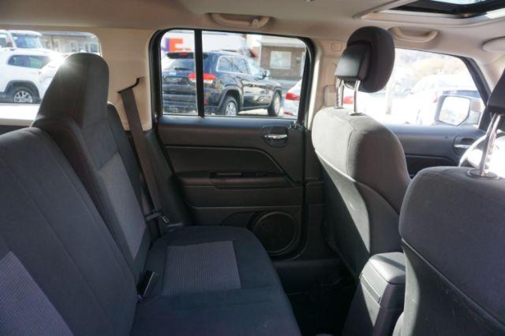 2011 Bright Silver Metall /Dark Slate Gray Clot Jeep Patriot 4WD (1J4NF1GB9BD) with an 2.4L L4 DOHC 16V engine, located at 312 Centre Ave, Schuylkill Haven, PA, 17972, (570) 593-5278, 40.638130, -76.177383 - Photo#37