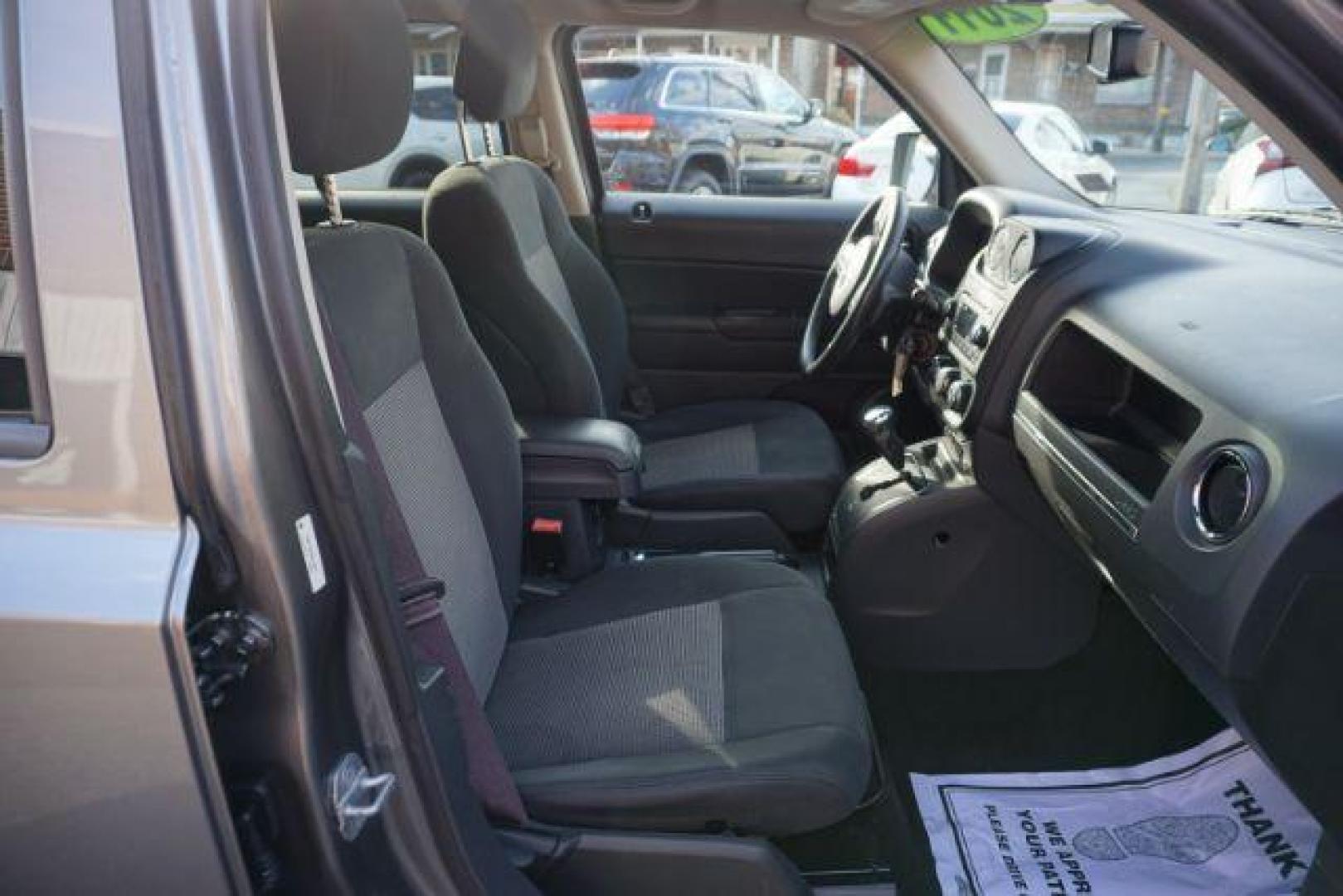 2011 Bright Silver Metall /Dark Slate Gray Clot Jeep Patriot 4WD (1J4NF1GB9BD) with an 2.4L L4 DOHC 16V engine, located at 312 Centre Ave, Schuylkill Haven, PA, 17972, (570) 593-5278, 40.638130, -76.177383 - Photo#45