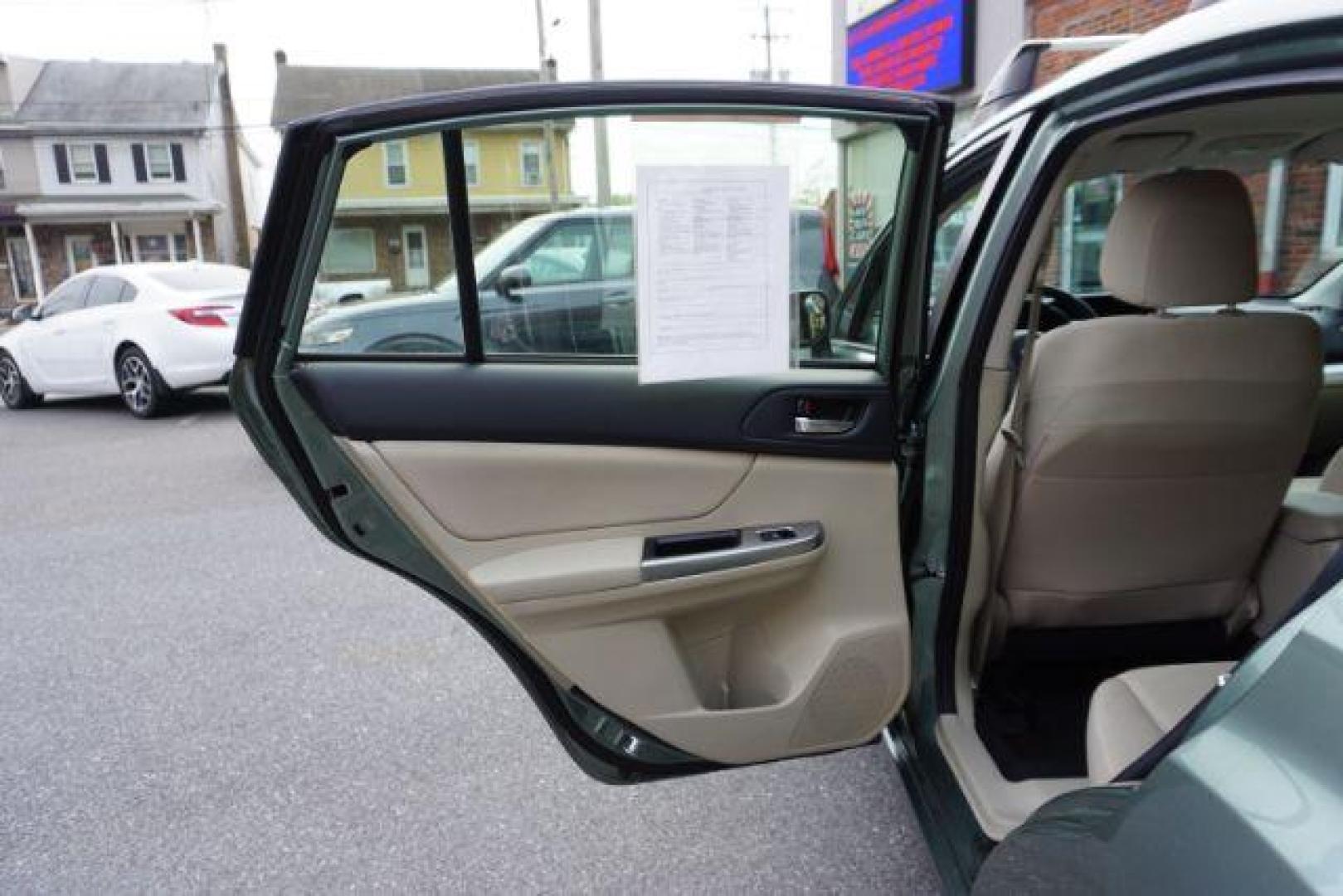 2015 Jasmine Green Metallic /Ivory, cloth Subaru Impreza 2.0i Premium PZEV 5-Door (JF1GPAC63FH) with an 2.0L H4 DOHC 16V engine, Continuously Variable Transmission transmission, located at 312 Centre Ave, Schuylkill Haven, PA, 17972, (570) 593-5278, 40.638130, -76.177383 - Photo#28