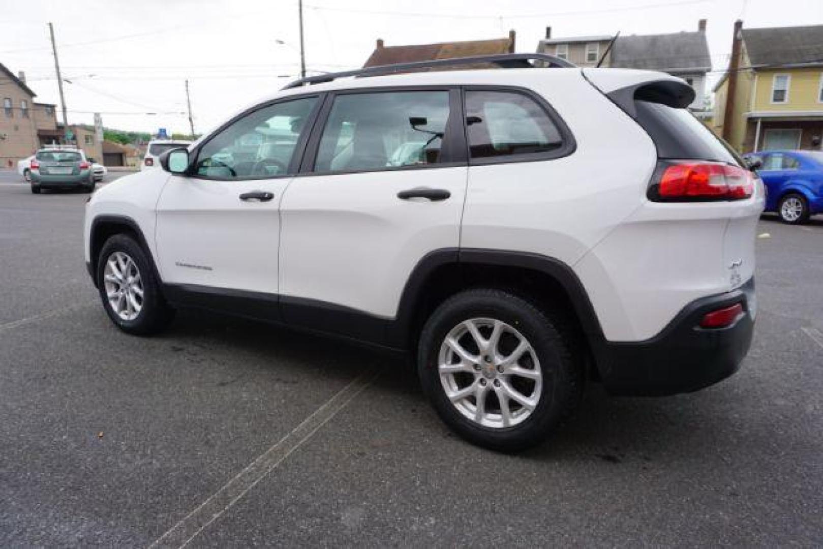 2016 Bright White Clear Coat /Black, cloth Jeep Cherokee Sport 4WD (1C4PJMAB8GW) with an 2.4L L4 DOHC 16V engine, 9-Speed Automatic transmission, located at 312 Centre Ave, Schuylkill Haven, PA, 17972, (570) 593-5278, 40.638130, -76.177383 - aluminum/alloy wheels - Photo#7