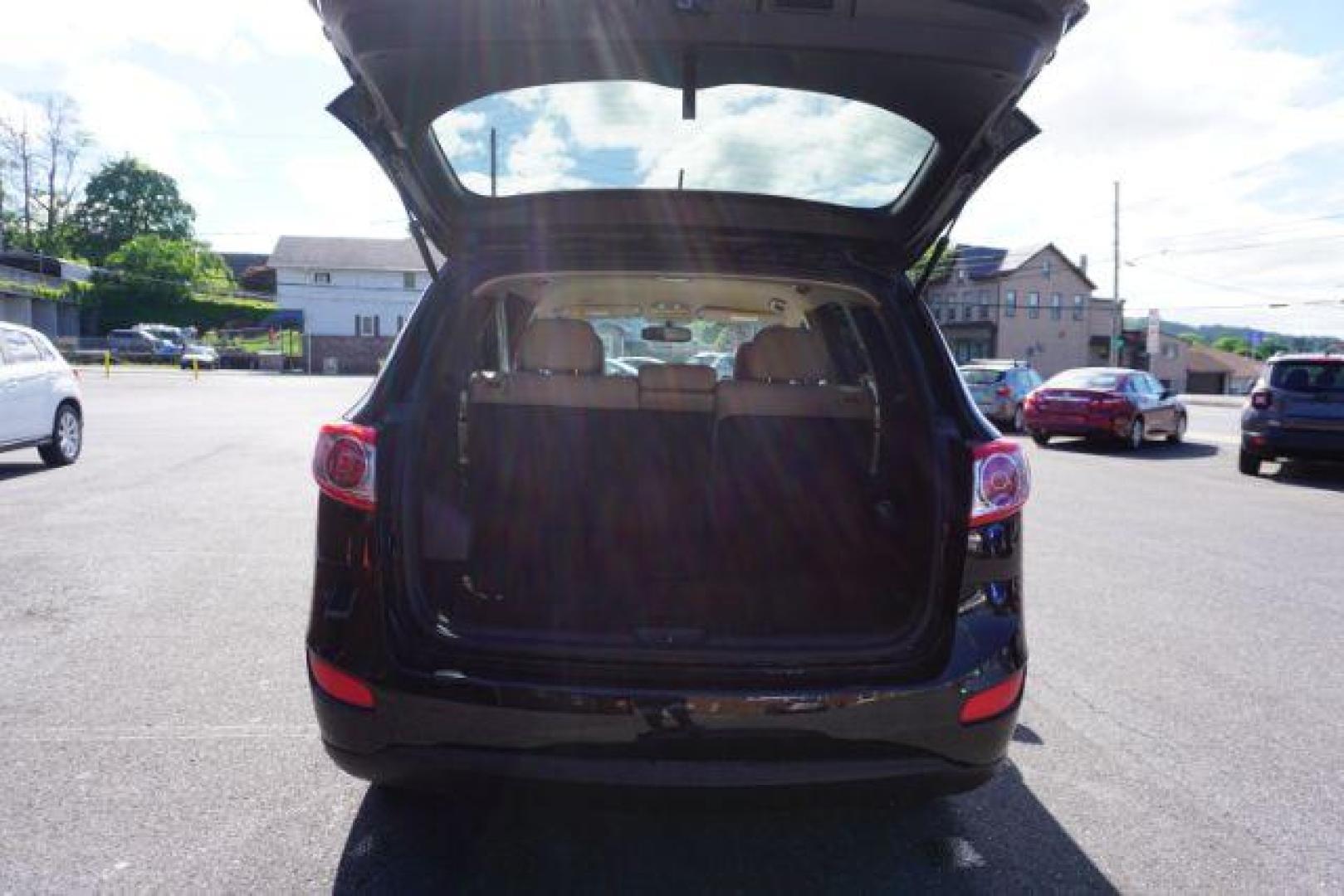 2012 Twilight Black Hyundai Santa Fe SPORT UTILITY 4-DR (5XYZGDAB1CG) with an 2.4L L4 DOHC 16V engine, 6-Speed Automatic transmission, located at 312 Centre Ave, Schuylkill Haven, PA, 17972, (570) 593-5278, 40.638130, -76.177383 - Photo#42