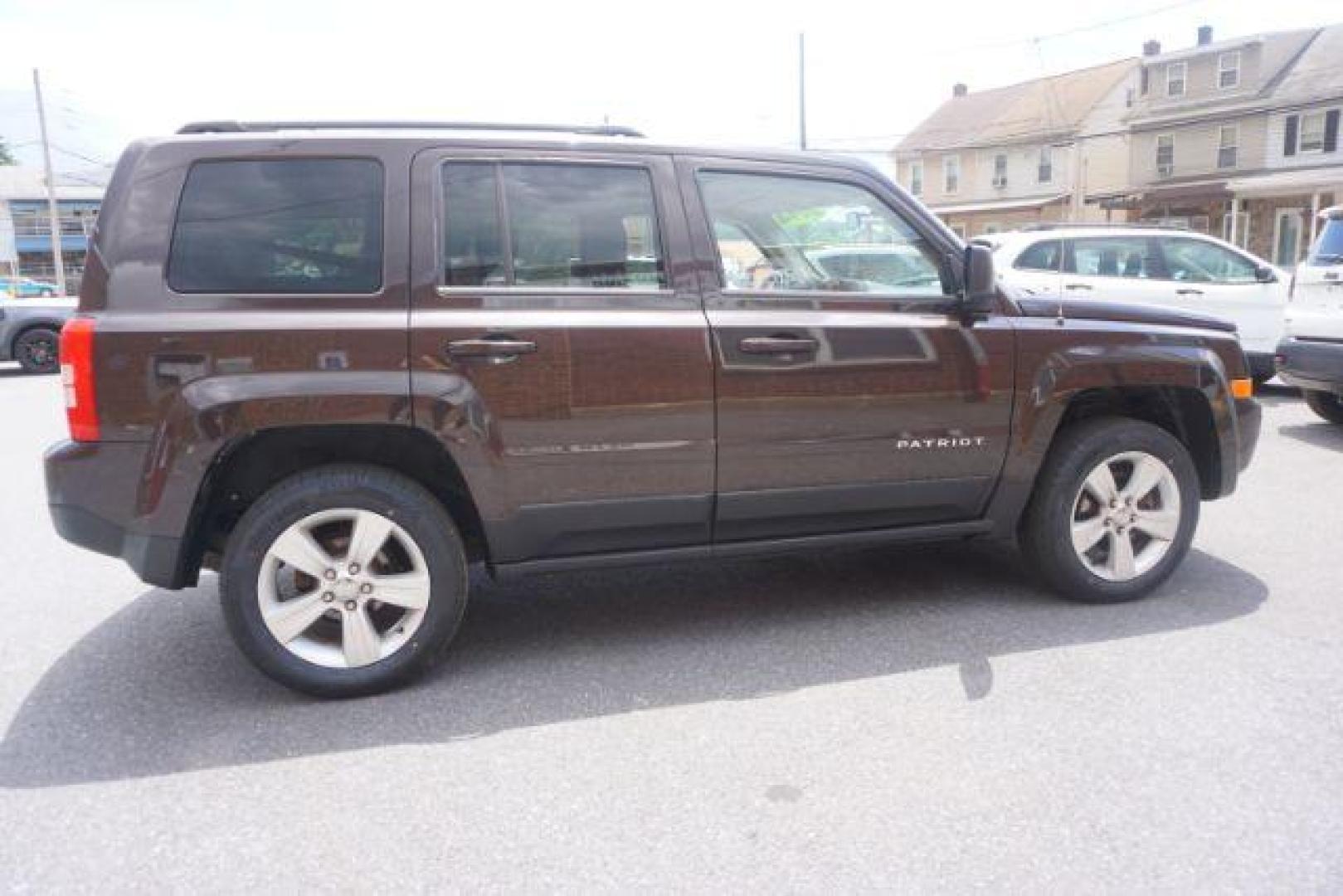 2014 Rugged Brown Pearlcoat /Light Pebble Beige/Dk Slate Jeep Patriot Latitude 4WD (1C4NJRFB3ED) with an 2.4L L4 DOHC 16V engine, Continuously Variable Transmission transmission, located at 312 Centre Ave, Schuylkill Haven, PA, 17972, (570) 593-5278, 40.638130, -76.177383 - Boston Accoustics stereo, locking/limited slip differential, power sunroof - Photo#9