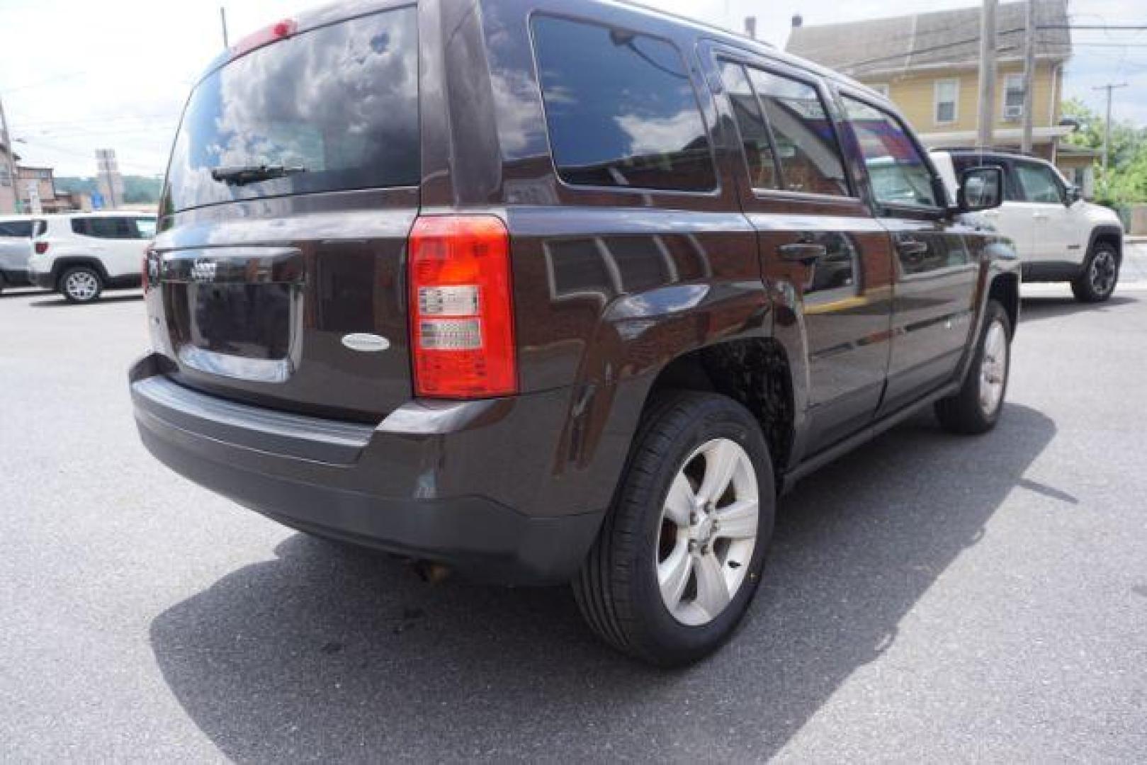 2014 Rugged Brown Pearlcoat /Light Pebble Beige/Dk Slate Jeep Patriot Latitude 4WD (1C4NJRFB3ED) with an 2.4L L4 DOHC 16V engine, Continuously Variable Transmission transmission, located at 312 Centre Ave, Schuylkill Haven, PA, 17972, (570) 593-5278, 40.638130, -76.177383 - Boston Accoustics stereo, locking/limited slip differential, power sunroof - Photo#10