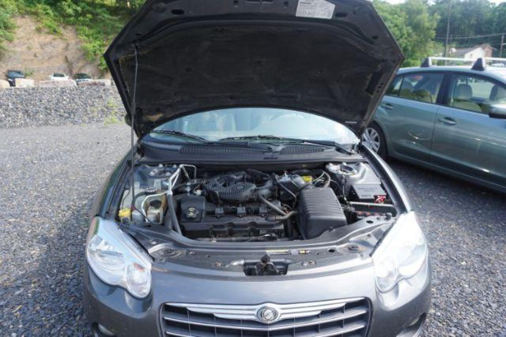 2005 Satin Jade Pearl with Black Cloth Top Chrysler Sebring Limited Convertible (1C3EL65R75N) with an 2.7L V6 DOHC 24V FFV engine, 4-Speed Automatic transmission, located at 312 Centre Ave, Schuylkill Haven, PA, 17972, (570) 593-5278, 40.638130, -76.177383 - Photo#31