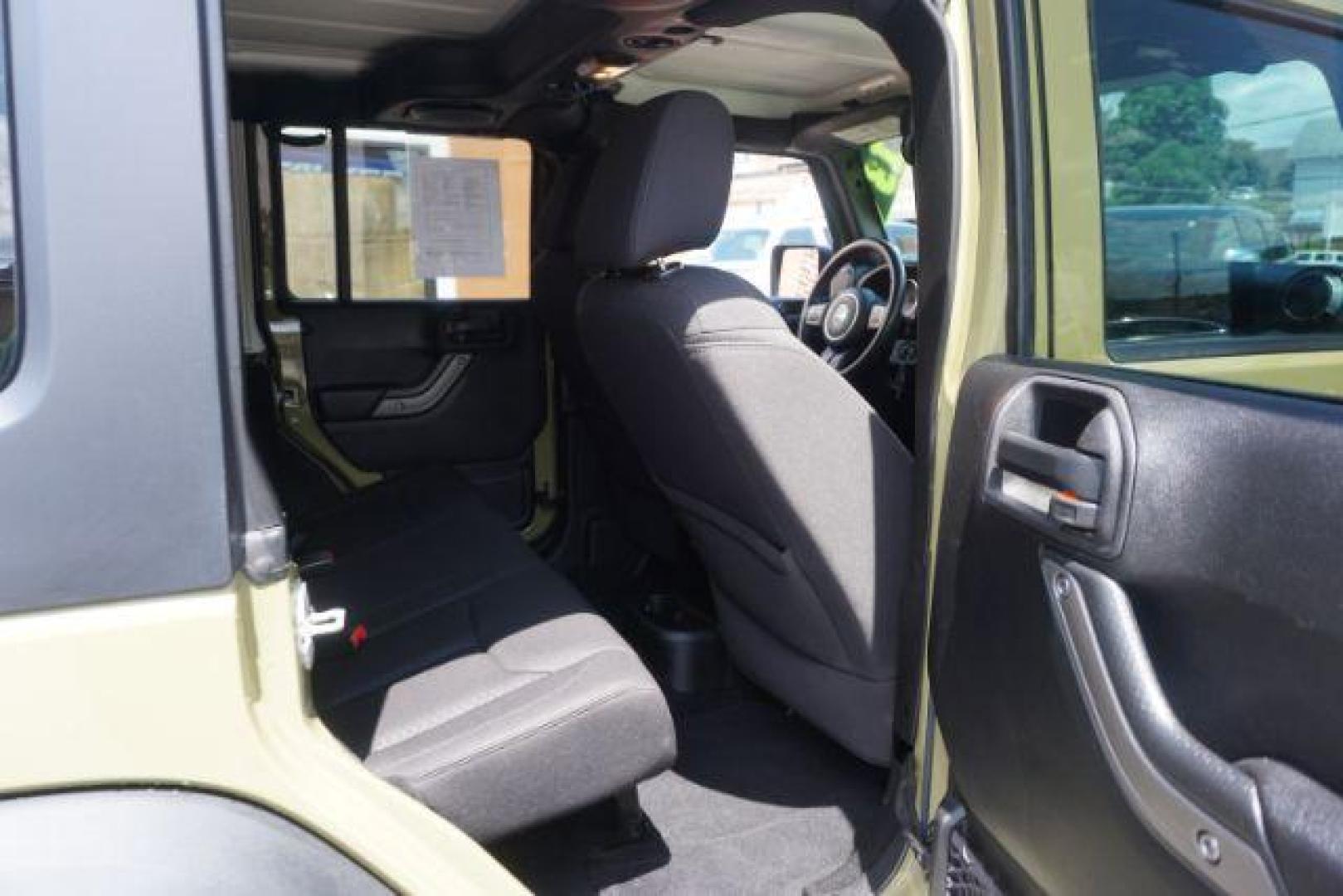 2013 Commando Green with Black Hard Top /Black Cloth Interior Jeep Wrangler Unlimited Sport 4WD (1C4BJWDG8DL) with an 3.6L V6 DOHC 24V FFV engine, 5-Speed Automatic transmission, located at 312 Centre Ave, Schuylkill Haven, PA, 17972, (570) 593-5278, 40.638130, -76.177383 - Alpine Stereo System, Bluetooth, Hard Top, Locking Limited Slip Diff, Automatic Transmission, - Photo#43