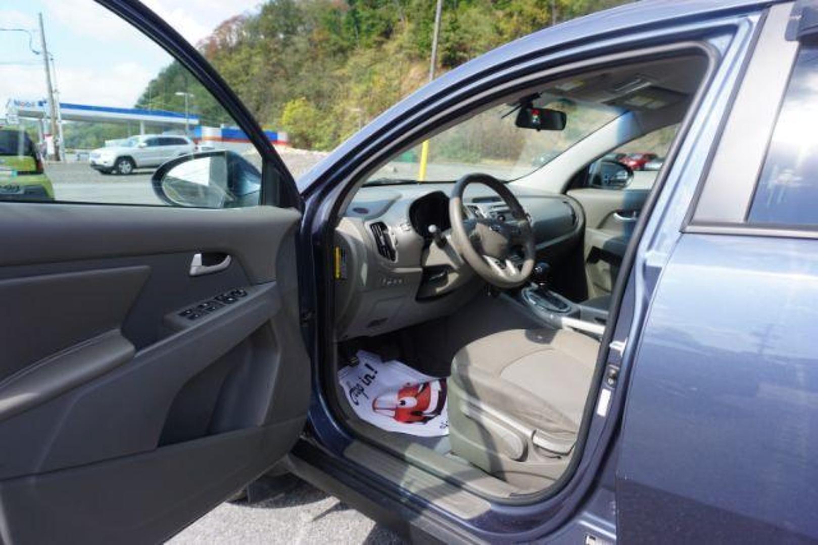 2016 Twilight Blue /Black, cloth Kia Sportage LX AWD (KNDPBCAC8G7) with an 2.4L V6 DOHC 24V engine, 6-Speed Automatic transmission, located at 312 Centre Ave, Schuylkill Haven, PA, 17972, (570) 593-5278, 40.638130, -76.177383 - remote engine starter, towing camper pkg - Photo#25