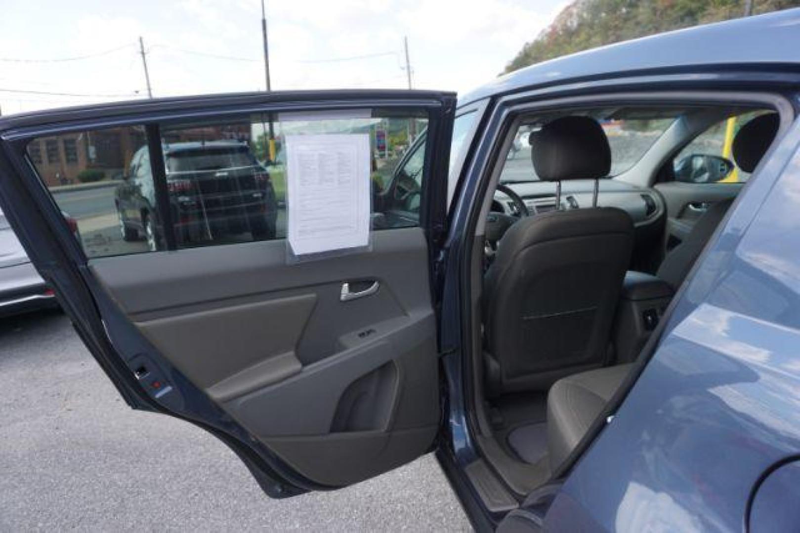 2016 Twilight Blue /Black, cloth Kia Sportage LX AWD (KNDPBCAC8G7) with an 2.4L V6 DOHC 24V engine, 6-Speed Automatic transmission, located at 312 Centre Ave, Schuylkill Haven, PA, 17972, (570) 593-5278, 40.638130, -76.177383 - remote engine starter, towing camper pkg - Photo#37