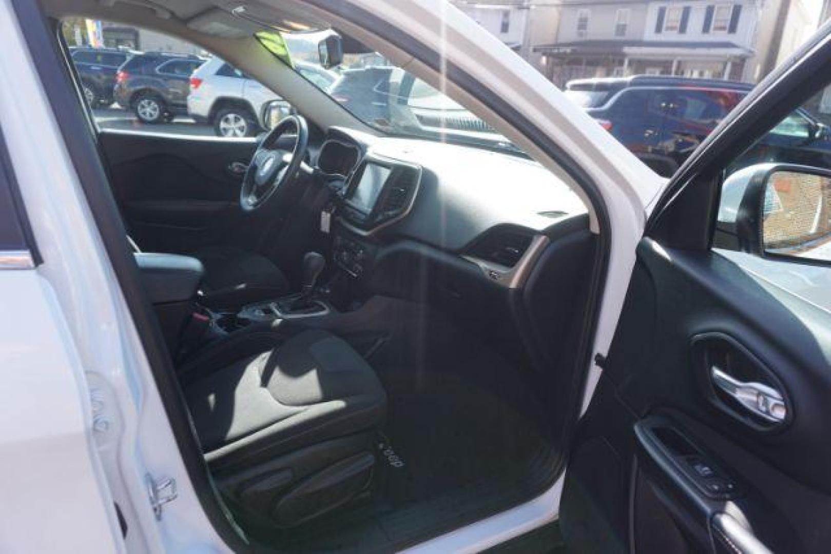2016 Bright White Clear Coat /Black, premium cloth Jeep Cherokee Latitude 4WD (1C4PJMCS9GW) with an 3.2L V6 DOHC 24V engine, 9-Speed Automatic transmission, located at 312 Centre Ave, Schuylkill Haven, PA, 17972, (570) 593-5278, 40.638130, -76.177383 - navigation, passive keyless entry, power drivers seat - Photo#54