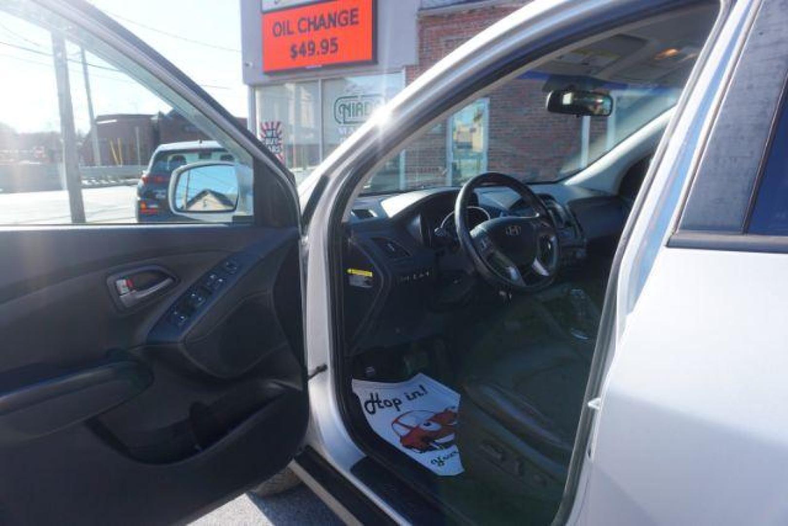 2014 Diamond Silver /Black Hyundai Tucson GLS AWD (KM8JUCAG5EU) with an 2.4L L4 DOHC 16V engine, 6-Speed Automatic transmission, located at 312 Centre Ave, Schuylkill Haven, PA, 17972, (570) 593-5278, 40.638130, -76.177383 - Photo#22