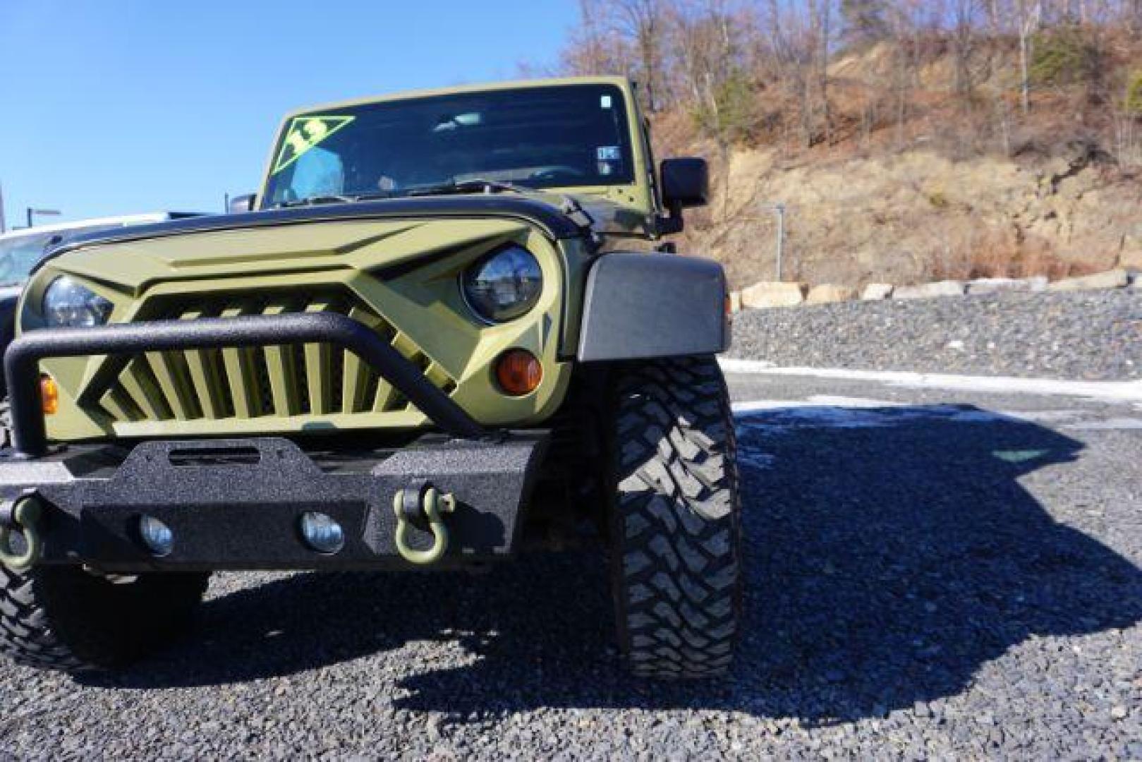 2013 Commando Green /Black Cloth Interior Jeep Wrangler Sport 4WD (1C4AJWAG7DL) with an 3.6L V6 DOHC 24V FFV engine, 6-Speed Manual transmission, located at 312 Centre Ave, Schuylkill Haven, PA, 17972, (570) 593-5278, 40.638130, -76.177383 - bluetooth, locking limited slip differential, towing pkg - Photo#2