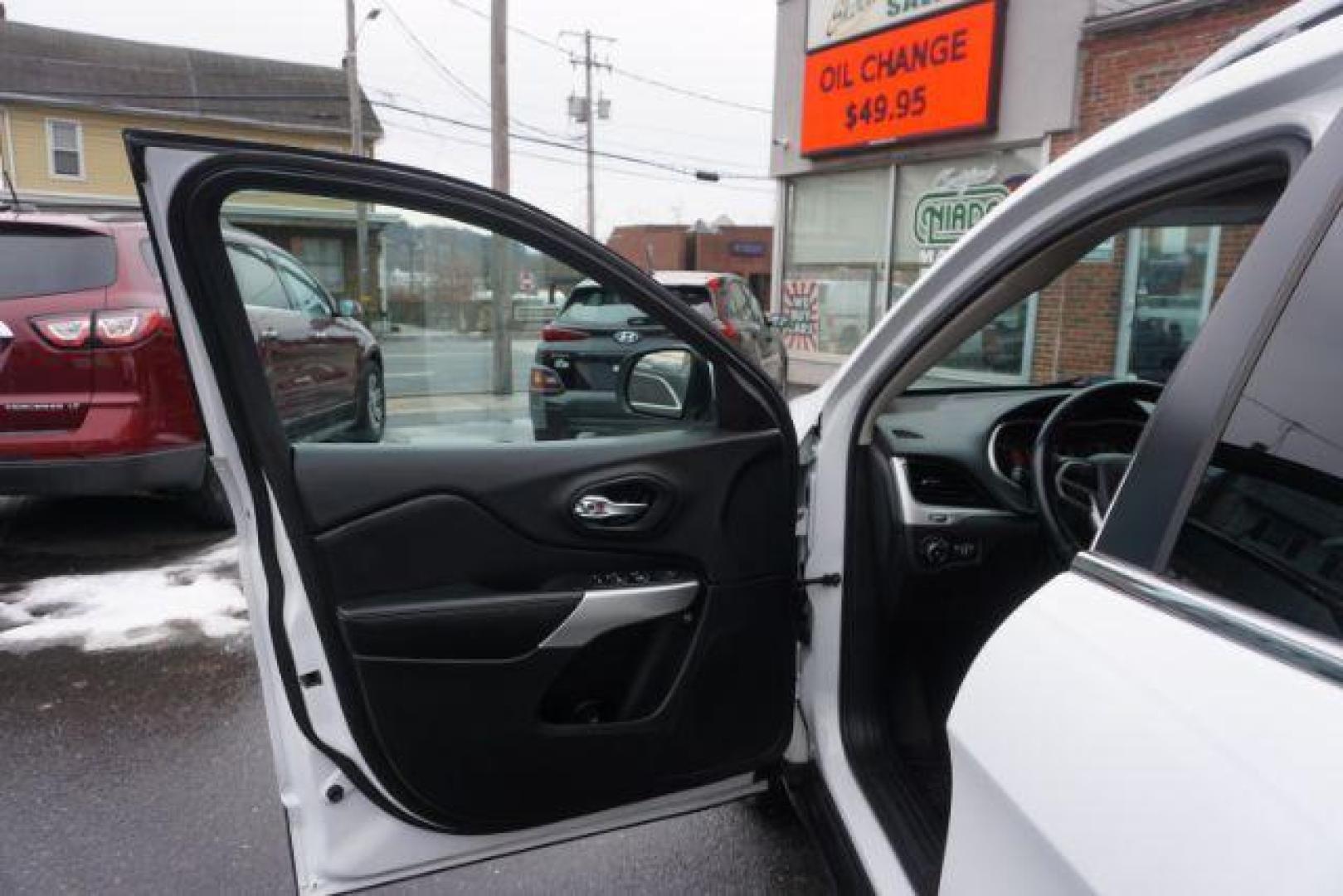 2018 Bright White Clear Coat /Black, leather/cloth Jeep Cherokee Latitude Plus 4WD (1C4PJMLX3JD) with an 3.2L V6 DOHC 24V engine, 9-Speed Automatic transmission, located at 312 Centre Ave, Schuylkill Haven, PA, 17972, (570) 593-5278, 40.638130, -76.177383 - Heated front seats, luggage rack, navigation, rear parking sensors, remote engine starter - Photo#17