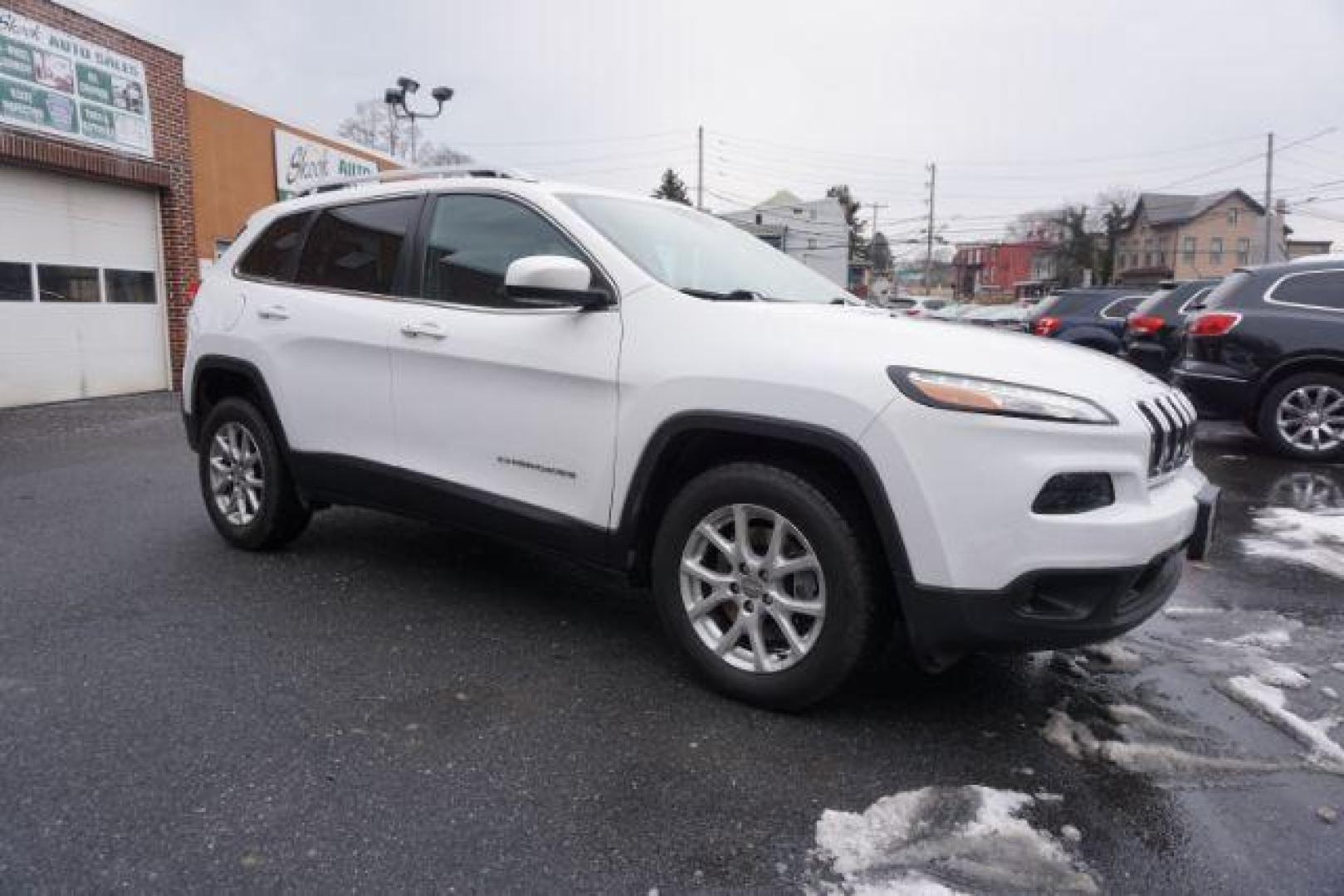 2018 Bright White Clear Coat /Black, leather/cloth Jeep Cherokee Latitude Plus 4WD (1C4PJMLX3JD) with an 3.2L V6 DOHC 24V engine, 9-Speed Automatic transmission, located at 312 Centre Ave, Schuylkill Haven, PA, 17972, (570) 593-5278, 40.638130, -76.177383 - Heated front seats, luggage rack, navigation, rear parking sensors, remote engine starter - Photo#5