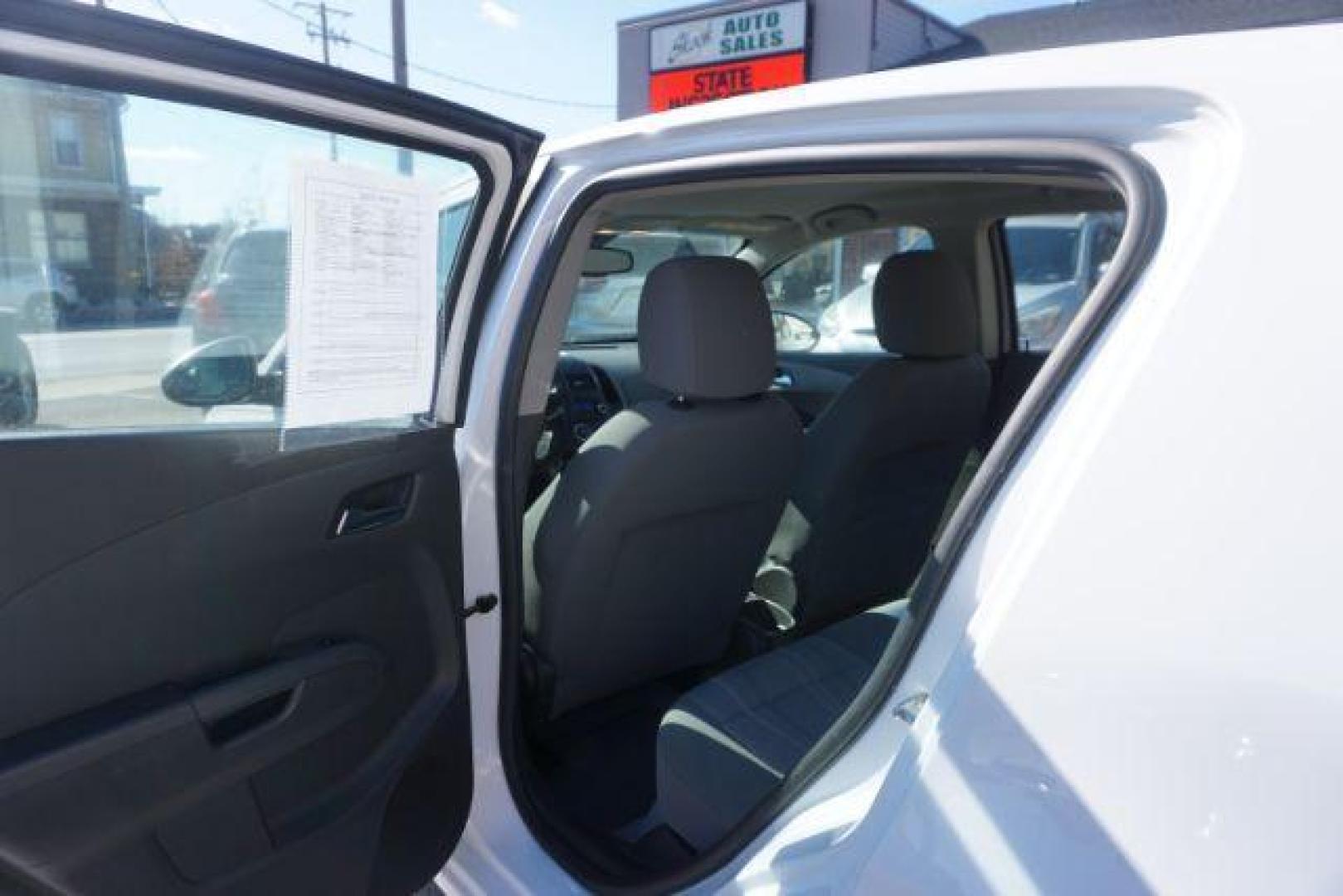 2013 Summit White Chevrolet Sonic LT Auto 5-Door (1G1JC6SG8D4) with an 1.8L L4 DOHC 24V engine, 6-Speed Automatic transmission, located at 312 Centre Ave, Schuylkill Haven, PA, 17972, (570) 593-5278, 40.638130, -76.177383 - Photo#29