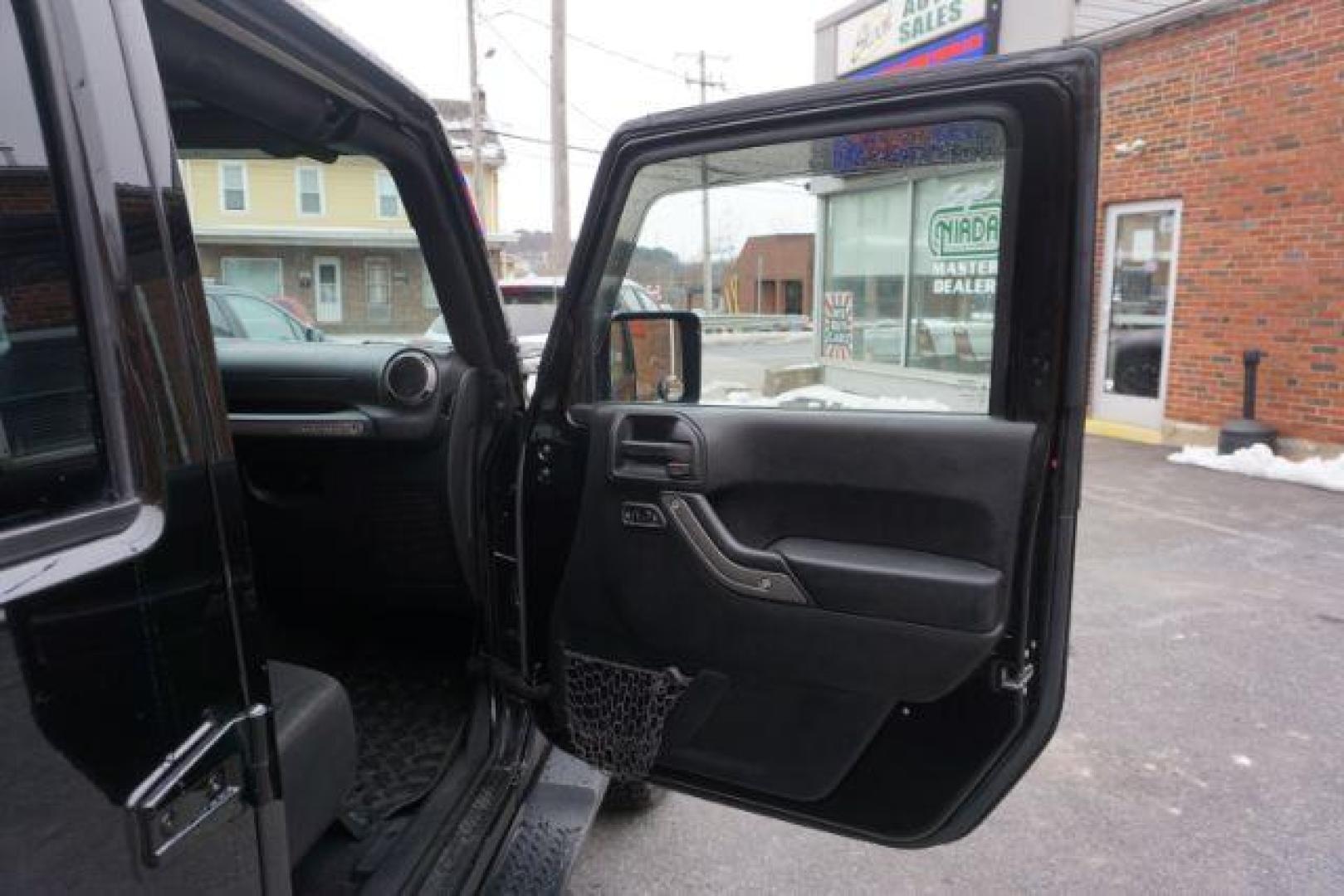 2016 black Jeep Wrangler Sport (1C4BJWDG9GL) with an 3.6 engine, auto transmission, located at 312 Centre Ave, Schuylkill Haven, PA, 17972, (570) 593-5278, 40.638130, -76.177383 - bluetooth, fixed running boards, hard top, locking limited slip differential, towing pkg, also comes with soft top and winch. - Photo#52