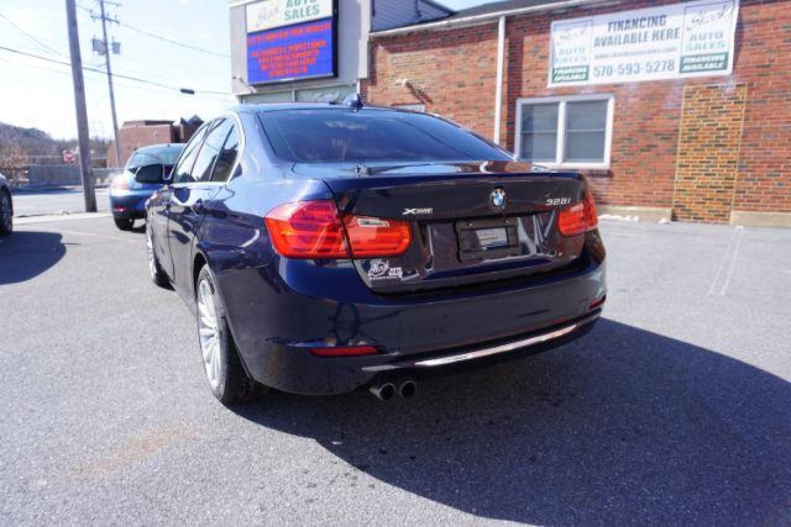 2015 Imperial Blue Metallic /Saddle Brown Dakota w/Exclusive Stitching, premium BMW 3-Series 328i xDrive Sedan (WBA3B5G56FN) with an 2.0L L4 DOHC 16V engine, 8-Speed Automatic transmission, located at 312 Centre Ave, Schuylkill Haven, PA, 17972, (570) 593-5278, 40.638130, -76.177383 - back up camera, blind spot monitor, collision avoidance system, heads up display, heated rear seats, lane departure warning, navigation, rear parking sensors - Photo#12
