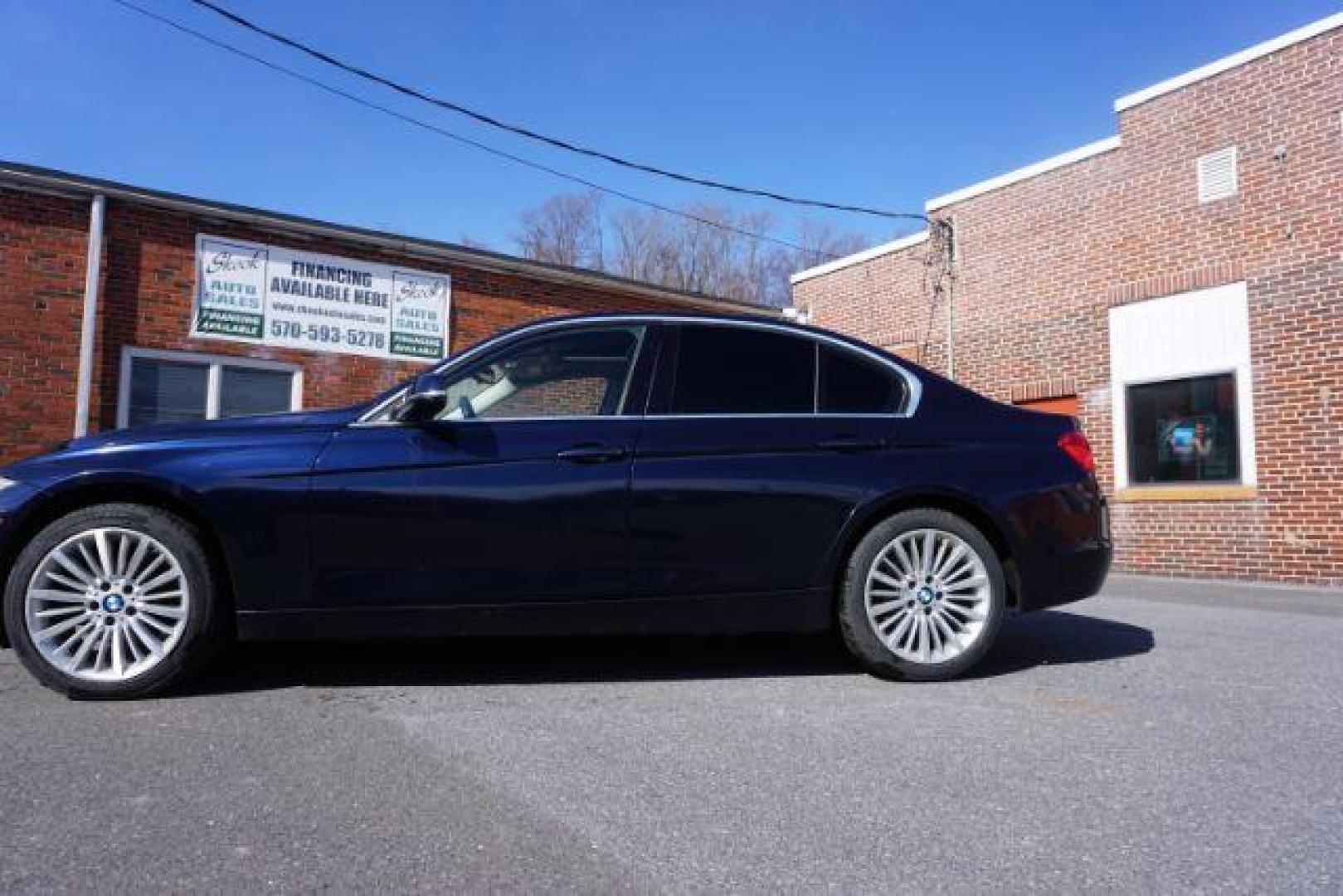 2015 Imperial Blue Metallic /Saddle Brown Dakota w/Exclusive Stitching, premium BMW 3-Series 328i xDrive Sedan (WBA3B5G56FN) with an 2.0L L4 DOHC 16V engine, 8-Speed Automatic transmission, located at 312 Centre Ave, Schuylkill Haven, PA, 17972, (570) 593-5278, 40.638130, -76.177383 - back up camera, blind spot monitor, collision avoidance system, heads up display, heated rear seats, lane departure warning, navigation, rear parking sensors - Photo#16