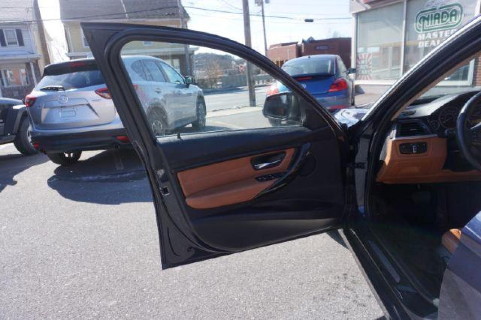 2015 Imperial Blue Metallic /Saddle Brown Dakota w/Exclusive Stitching, premium BMW 3-Series 328i xDrive Sedan (WBA3B5G56FN) with an 2.0L L4 DOHC 16V engine, 8-Speed Automatic transmission, located at 312 Centre Ave, Schuylkill Haven, PA, 17972, (570) 593-5278, 40.638130, -76.177383 - back up camera, blind spot monitor, collision avoidance system, heads up display, heated rear seats, lane departure warning, navigation, rear parking sensors - Photo#19