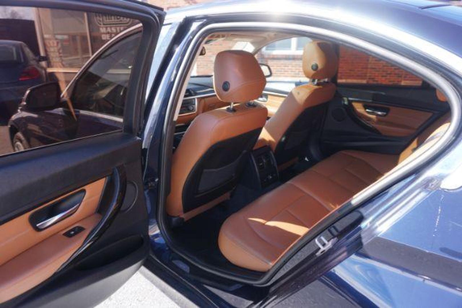 2015 Imperial Blue Metallic /Saddle Brown Dakota w/Exclusive Stitching, premium BMW 3-Series 328i xDrive Sedan (WBA3B5G56FN) with an 2.0L L4 DOHC 16V engine, 8-Speed Automatic transmission, located at 312 Centre Ave, Schuylkill Haven, PA, 17972, (570) 593-5278, 40.638130, -76.177383 - back up camera, blind spot monitor, collision avoidance system, heads up display, heated rear seats, lane departure warning, navigation, rear parking sensors - Photo#33