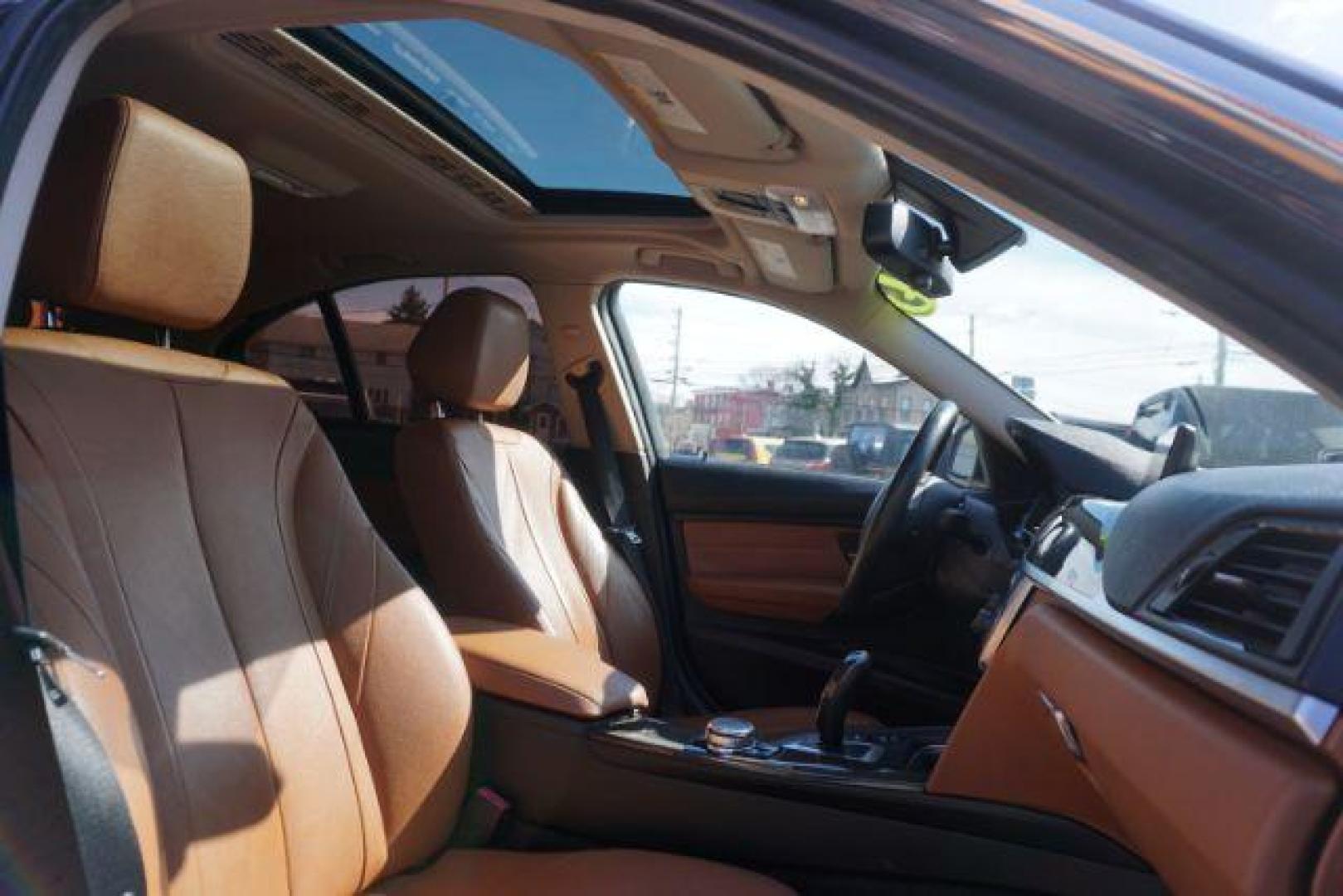 2015 Imperial Blue Metallic /Saddle Brown Dakota w/Exclusive Stitching, premium BMW 3-Series 328i xDrive Sedan (WBA3B5G56FN) with an 2.0L L4 DOHC 16V engine, 8-Speed Automatic transmission, located at 312 Centre Ave, Schuylkill Haven, PA, 17972, (570) 593-5278, 40.638130, -76.177383 - back up camera, blind spot monitor, collision avoidance system, heads up display, heated rear seats, lane departure warning, navigation, rear parking sensors - Photo#52