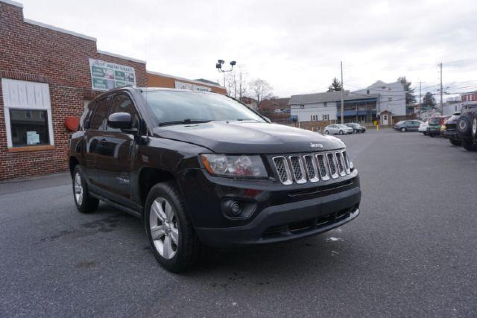 2014 Black Clearcoat /Dark Slate Gray Jeep Compass Latitude (1C4NJDEBXED) with an 2.4L I-4 DOHC engine, located at 312 Centre Ave, Schuylkill Haven, PA, 17972, (570) 593-5278, 40.638130, -76.177383 - bluetooth, locking/limited slip differential - Photo#5
