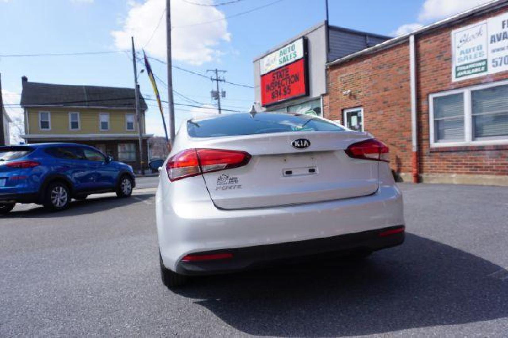 2017 Silky Silver /Gray Kia Forte LX (3KPFK4A74HE) with an 2L I-4 DOHC engine, located at 312 Centre Ave, Schuylkill Haven, PA, 17972, (570) 593-5278, 40.638130, -76.177383 - aluminum/alloy wheels - Photo#13