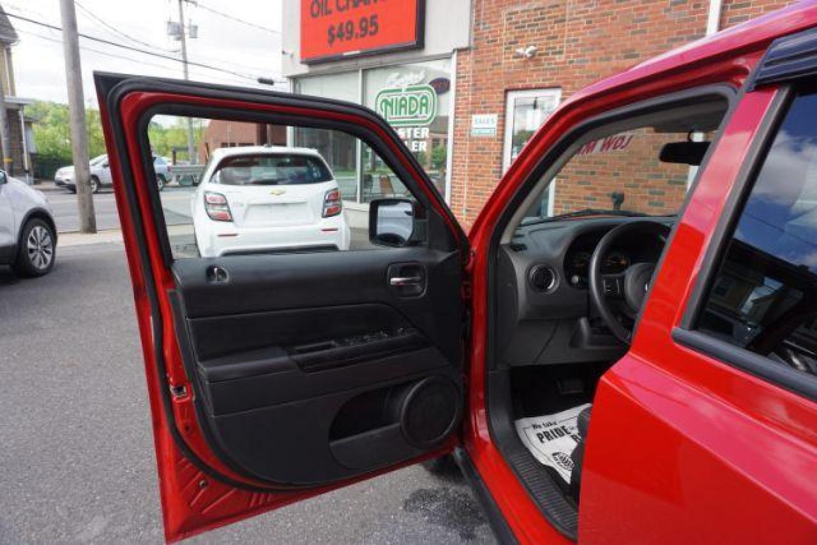 2016 Redline 2 Coat Pearl /Dark Slate Gray Jeep Patriot Sport SE (1C4NJRBB3GD) with an 2.4L I-4 DOHC engine, located at 312 Centre Ave, Schuylkill Haven, PA, 17972, (570) 593-5278, 40.638130, -76.177383 - Aluminum/Alloy wheels, Back up camera, locking/limited slip differential - Photo#18