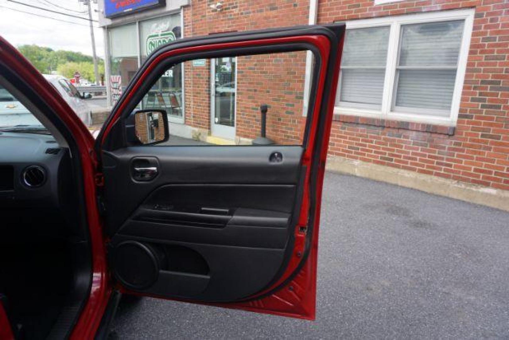 2016 Redline 2 Coat Pearl /Dark Slate Gray Jeep Patriot Sport SE (1C4NJRBB3GD) with an 2.4L I-4 DOHC engine, located at 312 Centre Ave, Schuylkill Haven, PA, 17972, (570) 593-5278, 40.638130, -76.177383 - Aluminum/Alloy wheels, Back up camera, locking/limited slip differential - Photo#48