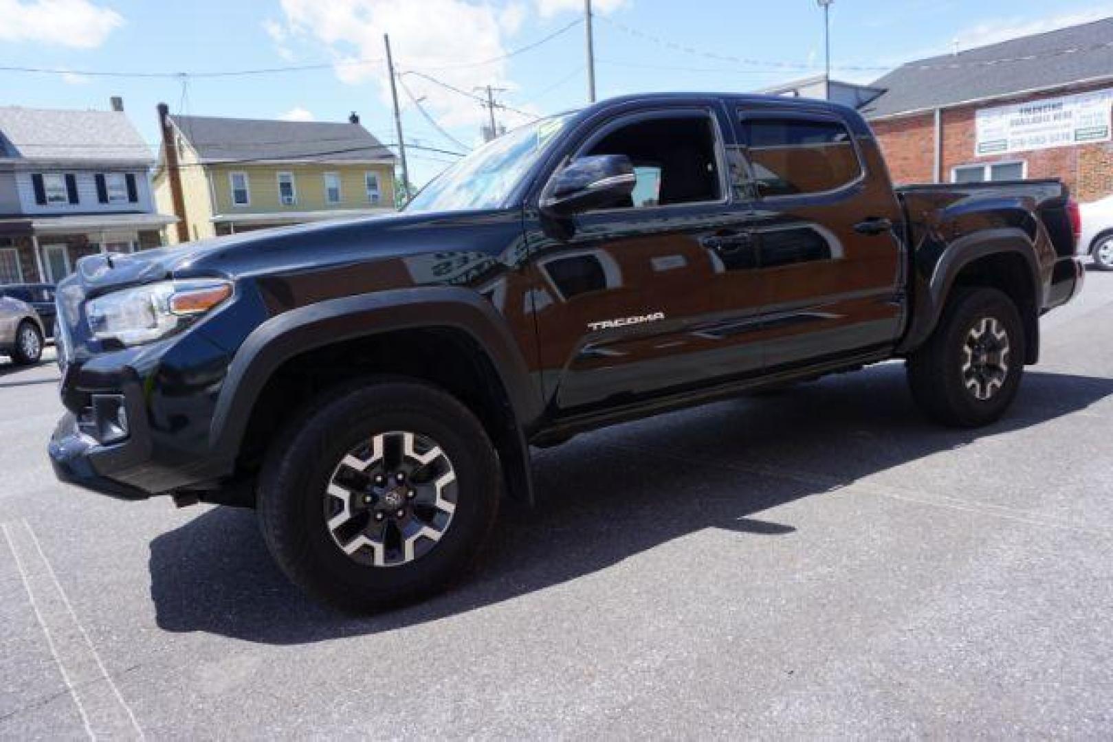 2018 Midnight Black Metallic Toyota Tacoma SR V6 | SR5 V6 | TRD Sport | TRD Off Road | TRD Pro | Limited (5TFCZ5AN4JX) with an 3.5L V-6 port/direct injection engine, located at 312 Centre Ave, Schuylkill Haven, PA, 17972, (570) 593-5278, 40.638130, -76.177383 - Aluminum/alloy wheels, Navigation system, rear parking sensor, hard bed cover, towing pkg - Photo#3