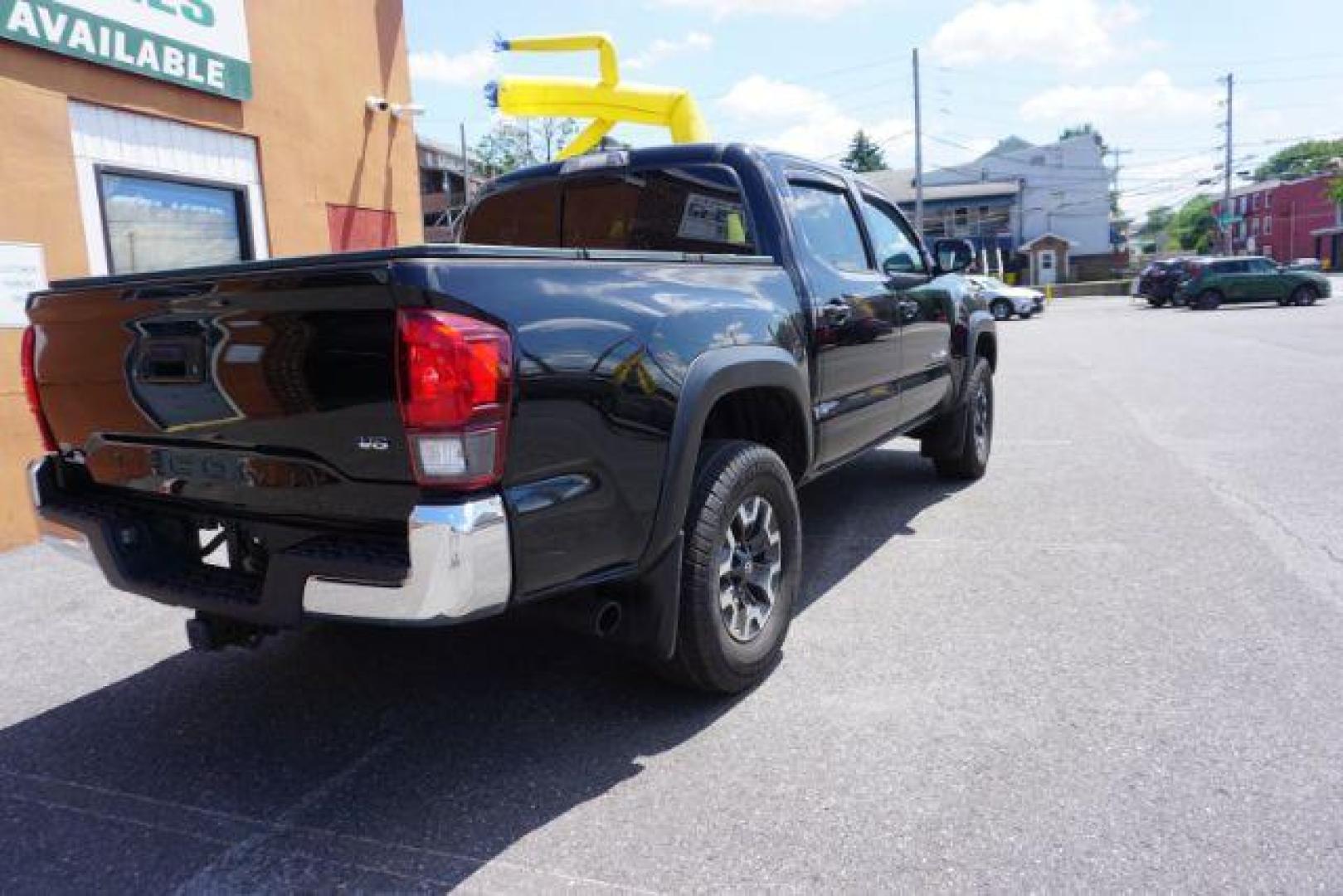 2018 Midnight Black Metallic Toyota Tacoma SR V6 | SR5 V6 | TRD Sport | TRD Off Road | TRD Pro | Limited (5TFCZ5AN4JX) with an 3.5L V-6 port/direct injection engine, located at 312 Centre Ave, Schuylkill Haven, PA, 17972, (570) 593-5278, 40.638130, -76.177383 - Aluminum/alloy wheels, Navigation system, rear parking sensor, hard bed cover, towing pkg - Photo#9