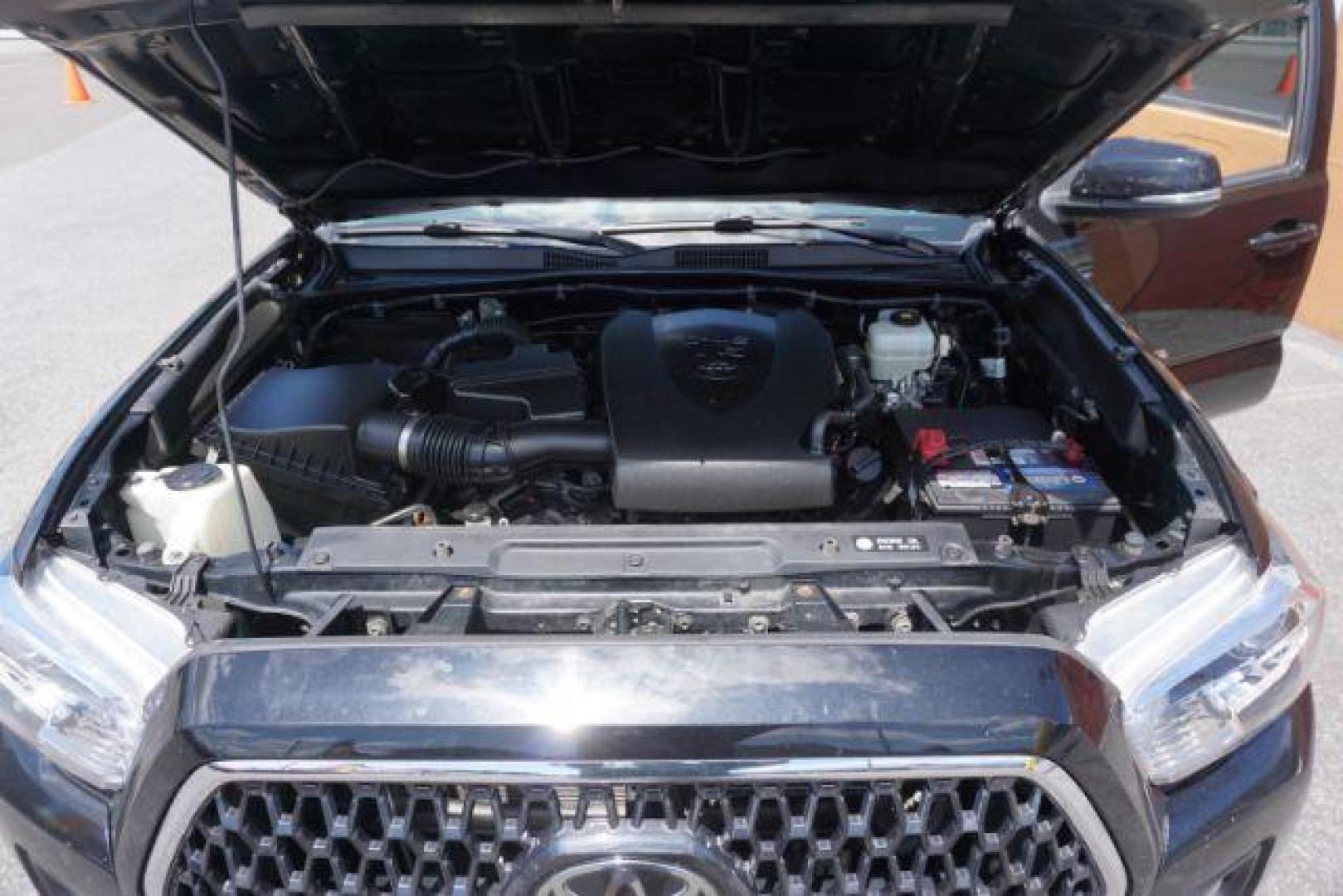 2018 Midnight Black Metallic Toyota Tacoma SR V6 | SR5 V6 | TRD Sport | TRD Off Road | TRD Pro | Limited (5TFCZ5AN4JX) with an 3.5L V-6 port/direct injection engine, located at 312 Centre Ave, Schuylkill Haven, PA, 17972, (570) 593-5278, 40.638130, -76.177383 - Aluminum/alloy wheels, Navigation system, rear parking sensor, hard bed cover, towing pkg - Photo#48