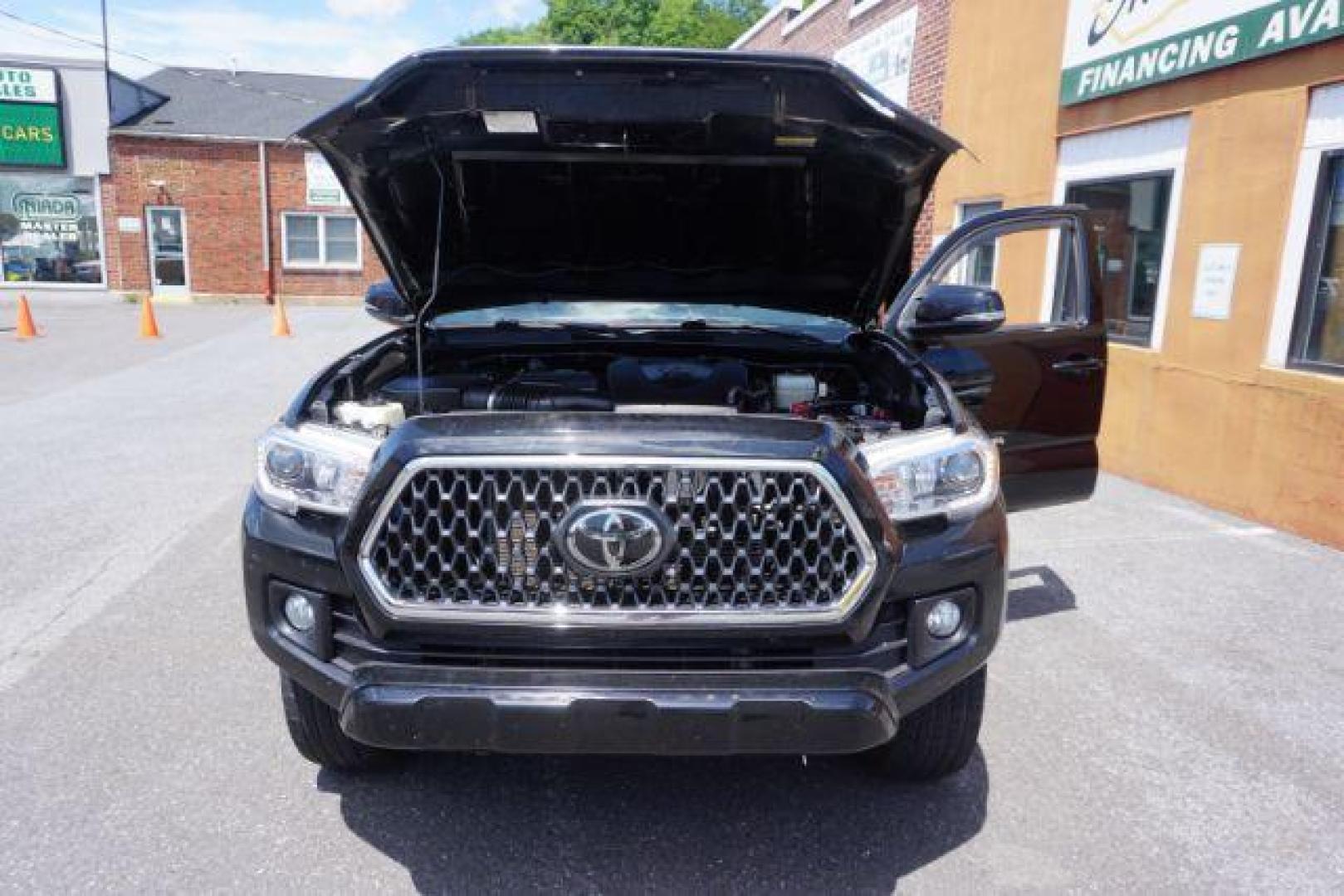 2018 Midnight Black Metallic Toyota Tacoma SR V6 | SR5 V6 | TRD Sport | TRD Off Road | TRD Pro | Limited (5TFCZ5AN4JX) with an 3.5L V-6 port/direct injection engine, located at 312 Centre Ave, Schuylkill Haven, PA, 17972, (570) 593-5278, 40.638130, -76.177383 - Aluminum/alloy wheels, Navigation system, rear parking sensor, hard bed cover, towing pkg - Photo#49