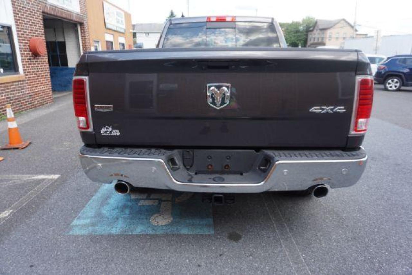 2015 Ram 1500 Laramie (1C6RR7VT0FS) with an HEMI 5.7L V-8 variable valve control engine, located at 312 Centre Ave, Schuylkill Haven, PA, 17972, (570) 593-5278, 40.638130, -76.177383 - back up camera, bluetooth connection, cooled front seats, heated front seats, locking/limited slip differential, navigation system, passive keyless entry, power driver's seat, rear parking sensors, remote engine starter, towing pkg - Photo#2