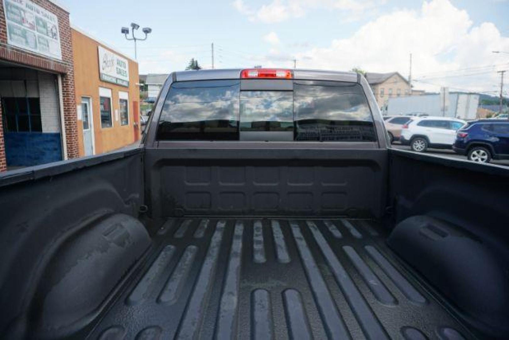 2015 Ram 1500 Laramie (1C6RR7VT0FS) with an HEMI 5.7L V-8 variable valve control engine, located at 312 Centre Ave, Schuylkill Haven, PA, 17972, (570) 593-5278, 40.638130, -76.177383 - back up camera, bluetooth connection, cooled front seats, heated front seats, locking/limited slip differential, navigation system, passive keyless entry, power driver's seat, rear parking sensors, remote engine starter, towing pkg - Photo#4