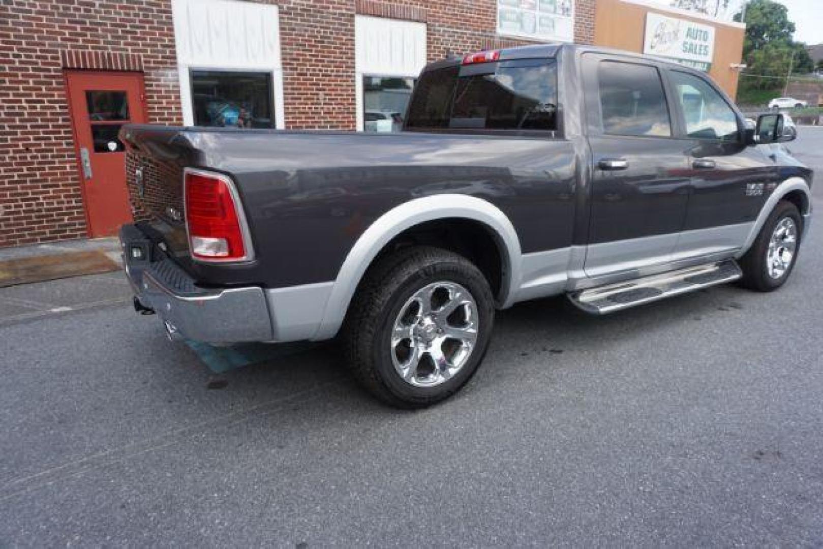 2015 Ram 1500 Laramie (1C6RR7VT0FS) with an HEMI 5.7L V-8 variable valve control engine, located at 312 Centre Ave, Schuylkill Haven, PA, 17972, (570) 593-5278, 40.638130, -76.177383 - back up camera, bluetooth connection, cooled front seats, heated front seats, locking/limited slip differential, navigation system, passive keyless entry, power driver's seat, rear parking sensors, remote engine starter, towing pkg - Photo#8