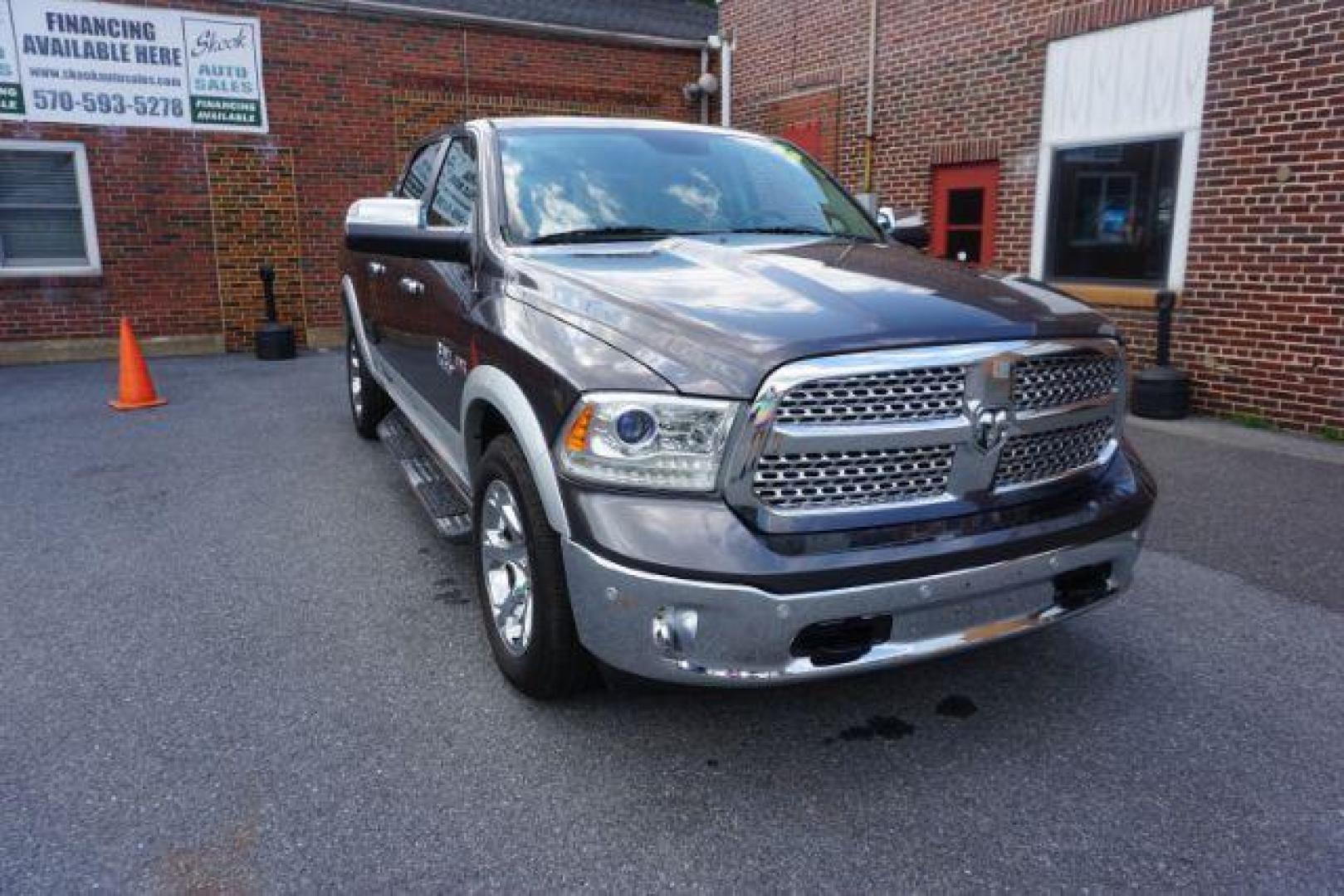 2015 Ram 1500 Laramie (1C6RR7VT0FS) with an HEMI 5.7L V-8 variable valve control engine, located at 312 Centre Ave, Schuylkill Haven, PA, 17972, (570) 593-5278, 40.638130, -76.177383 - back up camera, bluetooth connection, cooled front seats, heated front seats, locking/limited slip differential, navigation system, passive keyless entry, power driver's seat, rear parking sensors, remote engine starter, towing pkg - Photo#13