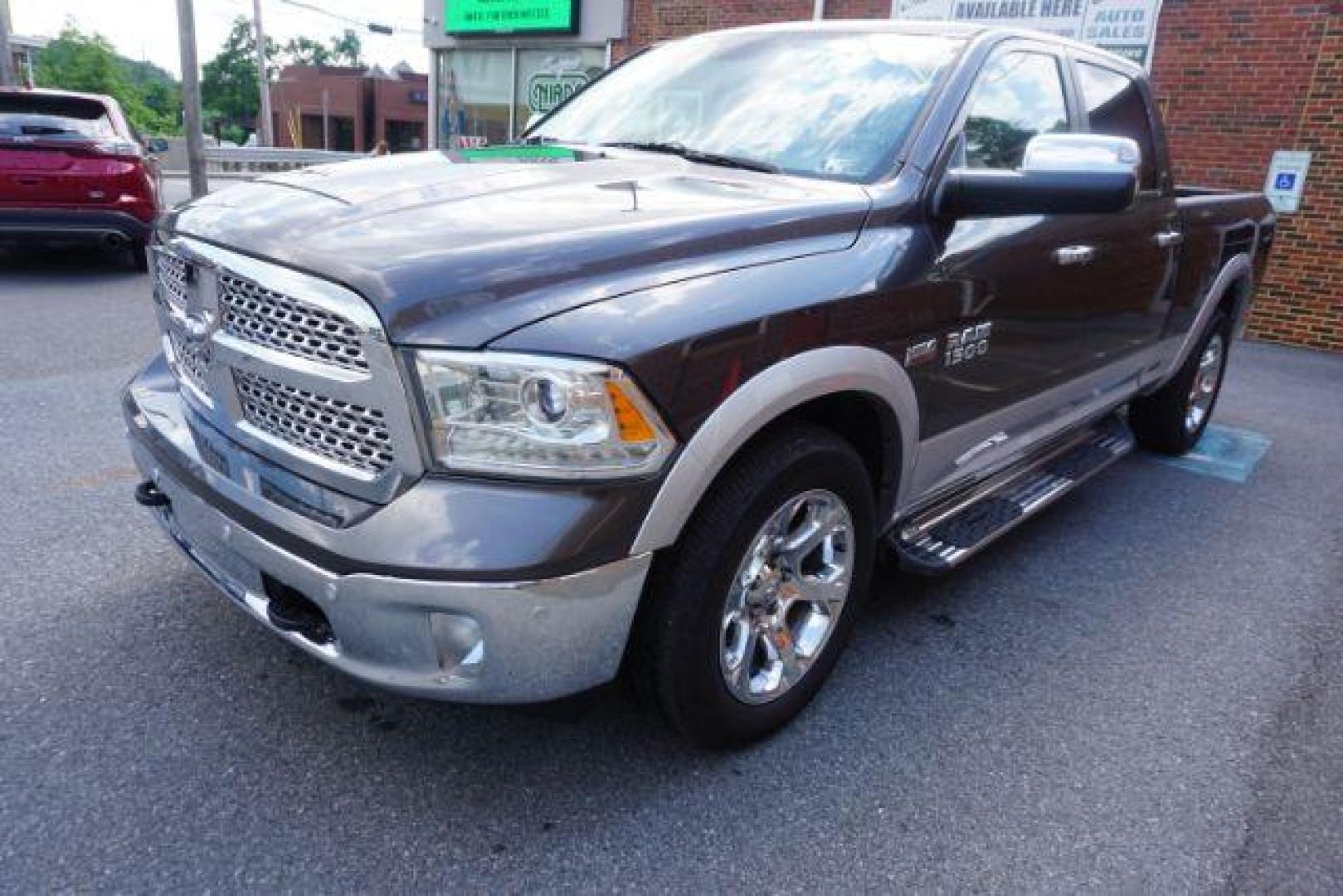2015 Ram 1500 Laramie (1C6RR7VT0FS) with an HEMI 5.7L V-8 variable valve control engine, located at 312 Centre Ave, Schuylkill Haven, PA, 17972, (570) 593-5278, 40.638130, -76.177383 - back up camera, bluetooth connection, cooled front seats, heated front seats, locking/limited slip differential, navigation system, passive keyless entry, power driver's seat, rear parking sensors, remote engine starter, towing pkg - Photo#31